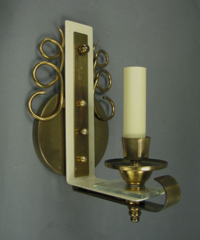Pair of brass and glass French sconces.

 