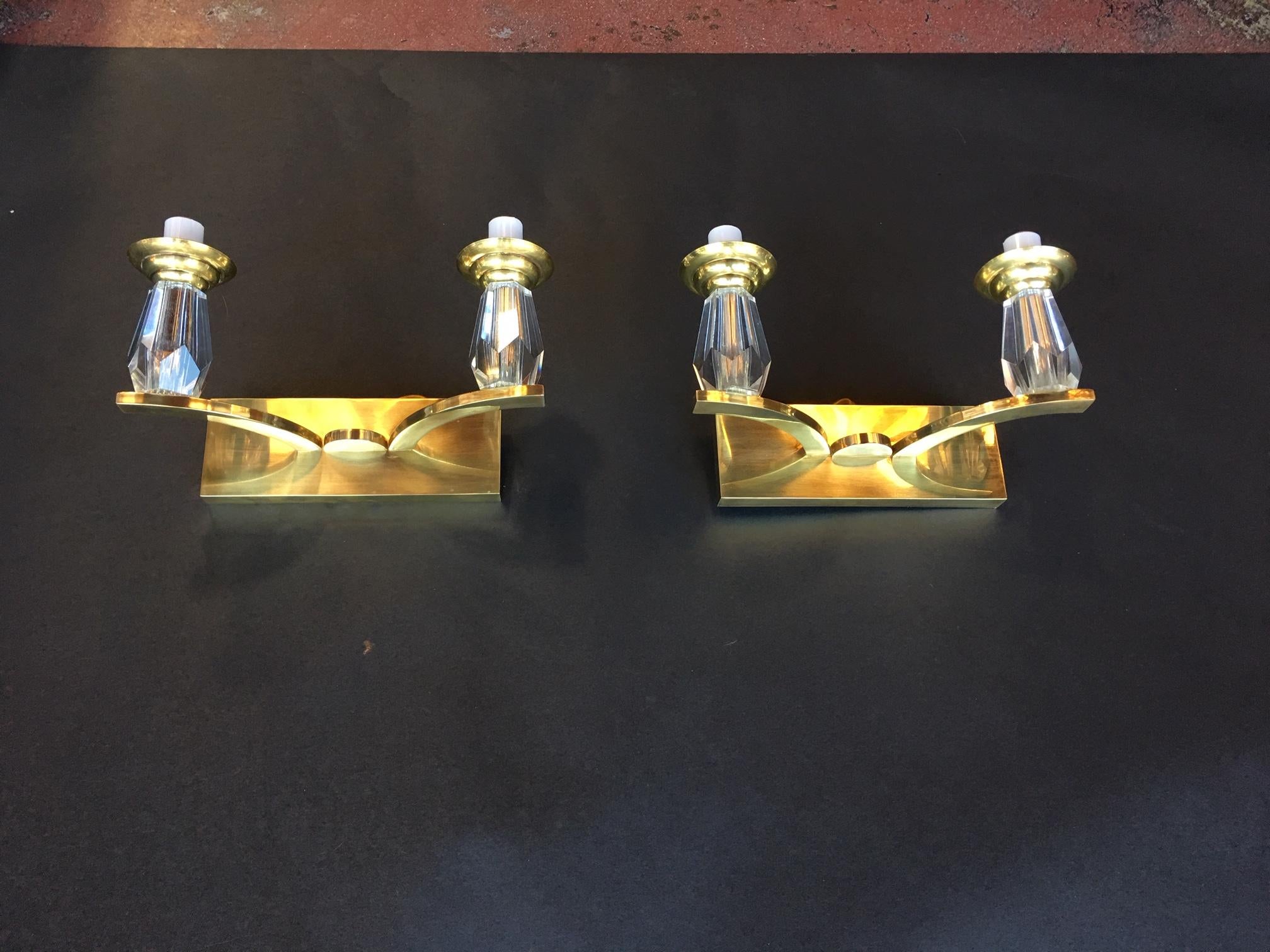 Pair of French Deco sconces. Brass and glass.