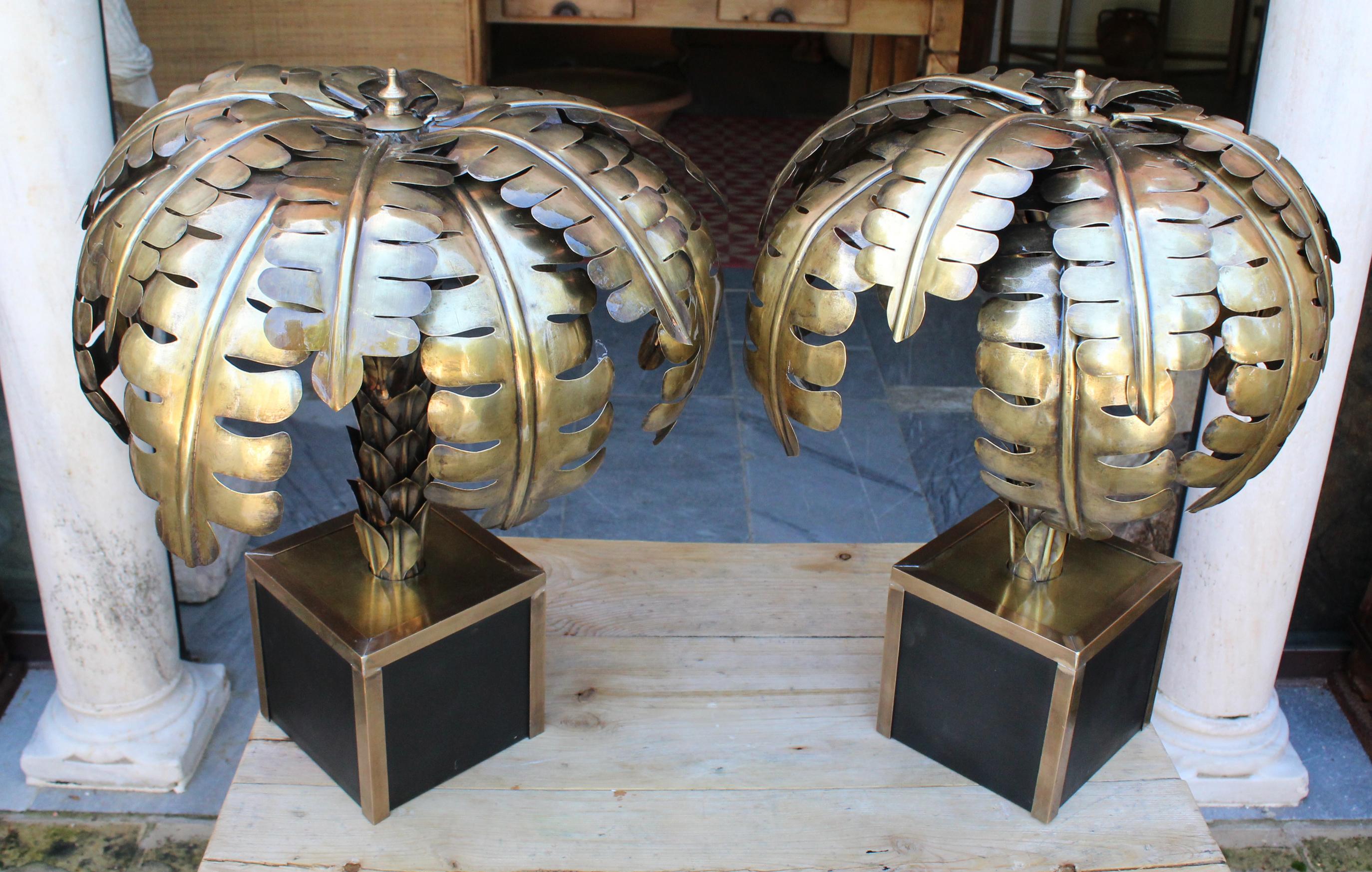 Pair of French designed gilded brass palm tree standing lamps with square bases.

Dimensions correspond to one of them.