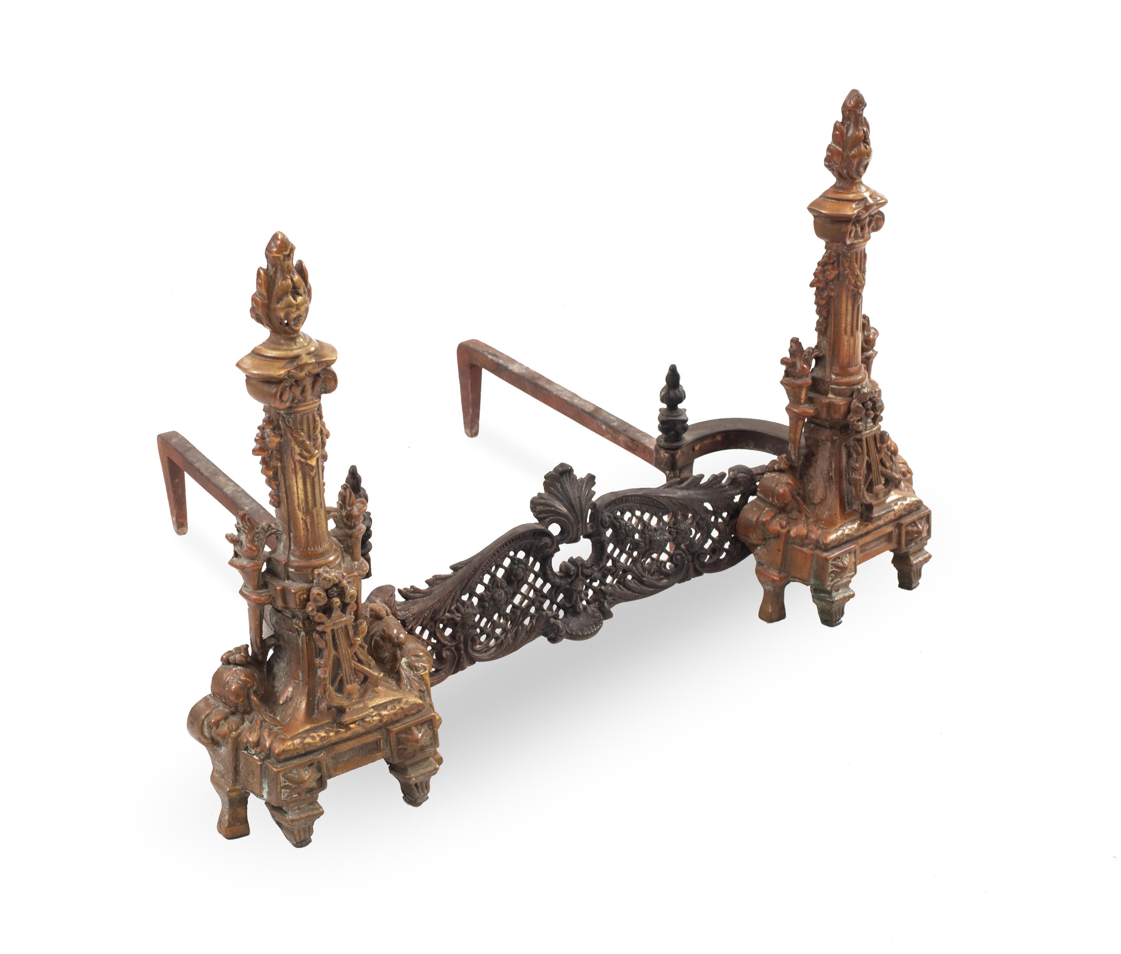 PAIR of French Directoire-style bronze andirons with filigree connector (PRICED AS PAIR)