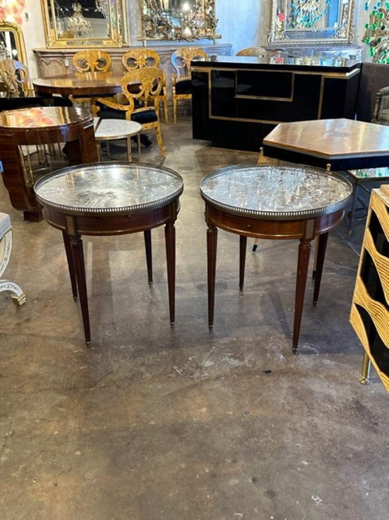 Pair of late 19th century French Directoire' style mahogany boulliotte tables. Circa 1890. Adds warmth and charm to any room!