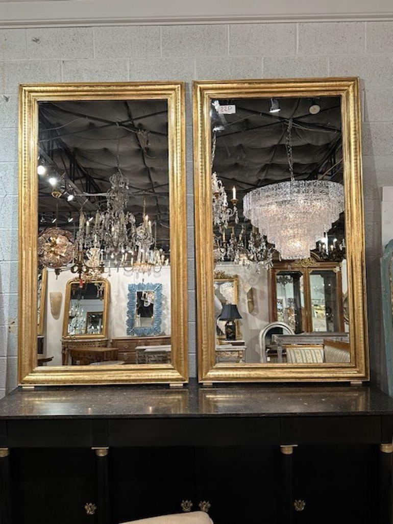 Pair of French Directoire' giltwood mirrors with geometric line pattern fame.