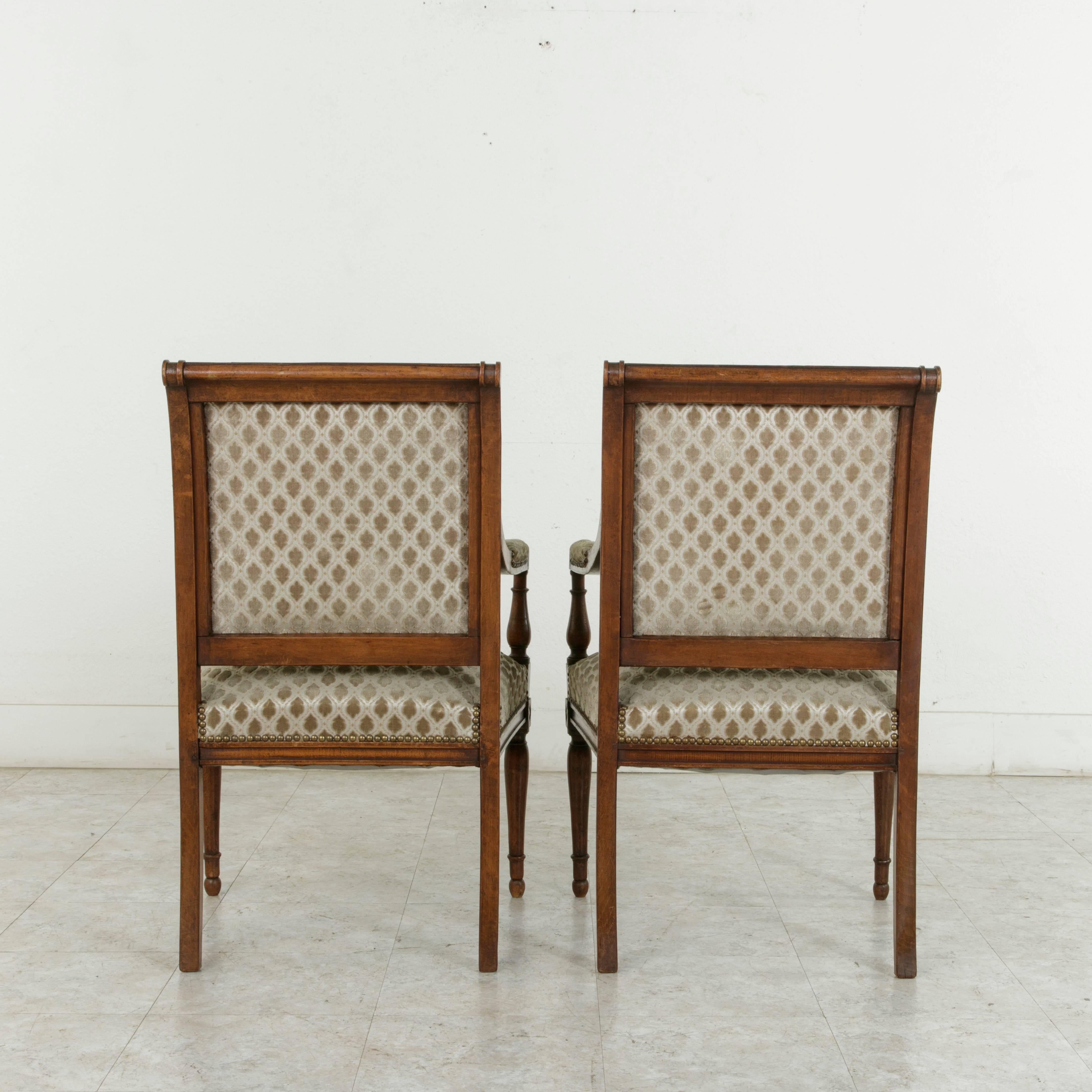 Early 19th Century Pair of French Directoire Period Hand-Carved Walnut Armchairs, circa 1800