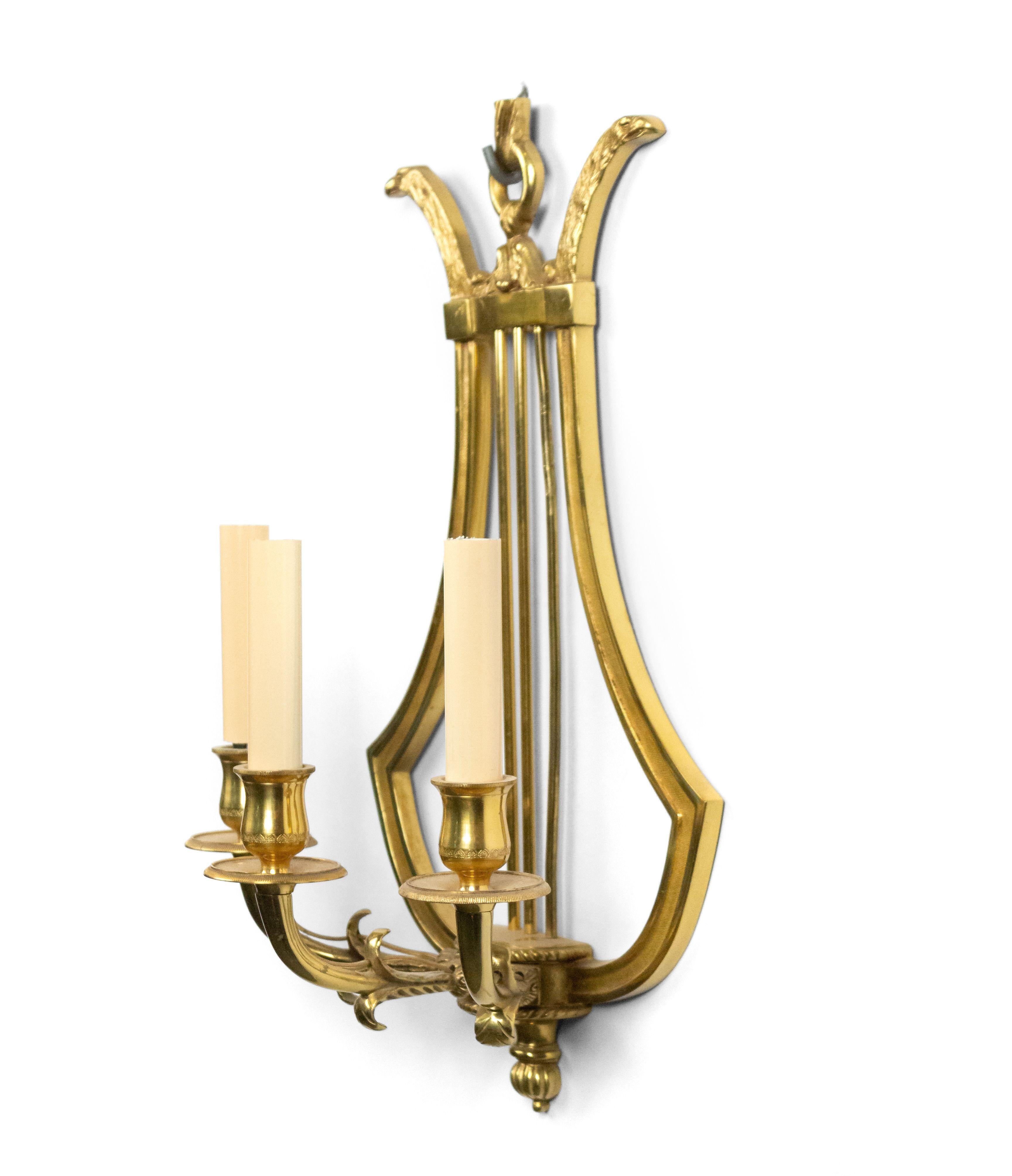 Metal Pair of French Directoire Style Brass Lyre Wall Sconces For Sale
