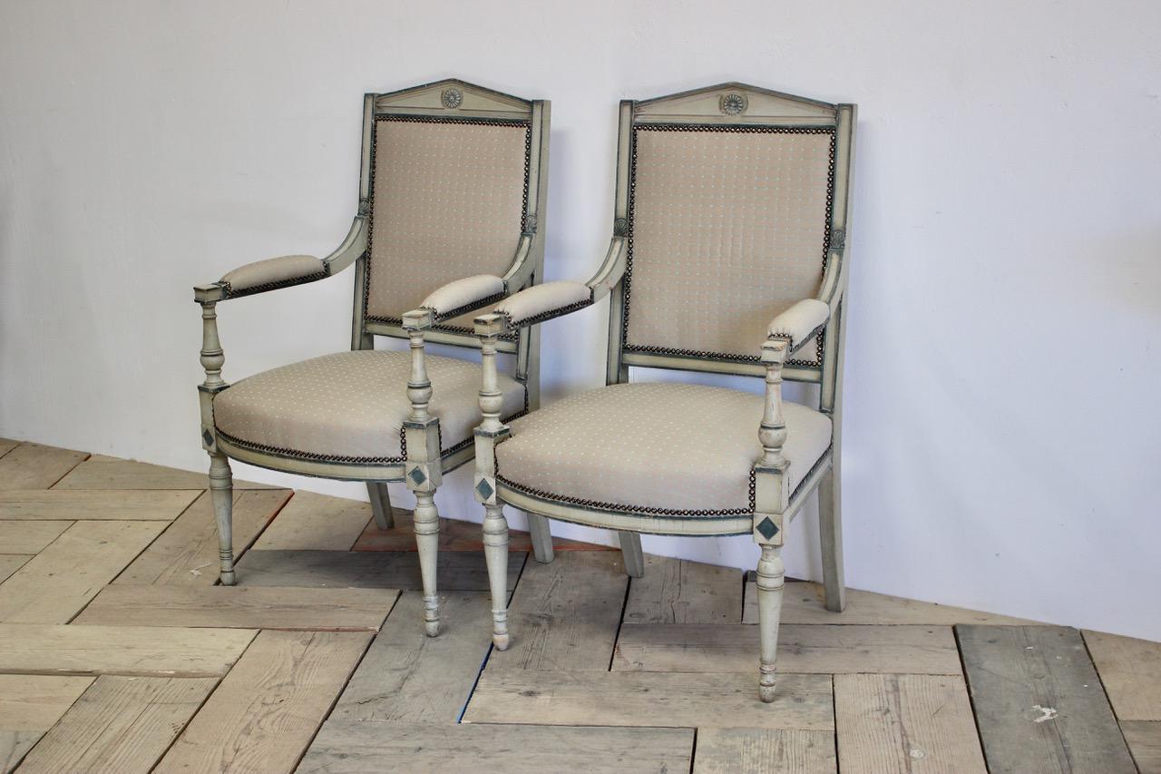 A pair of 1940s French painted fauteuils in the director taste, retaining the original paint.
Measures: Seat height 45 cm.
    