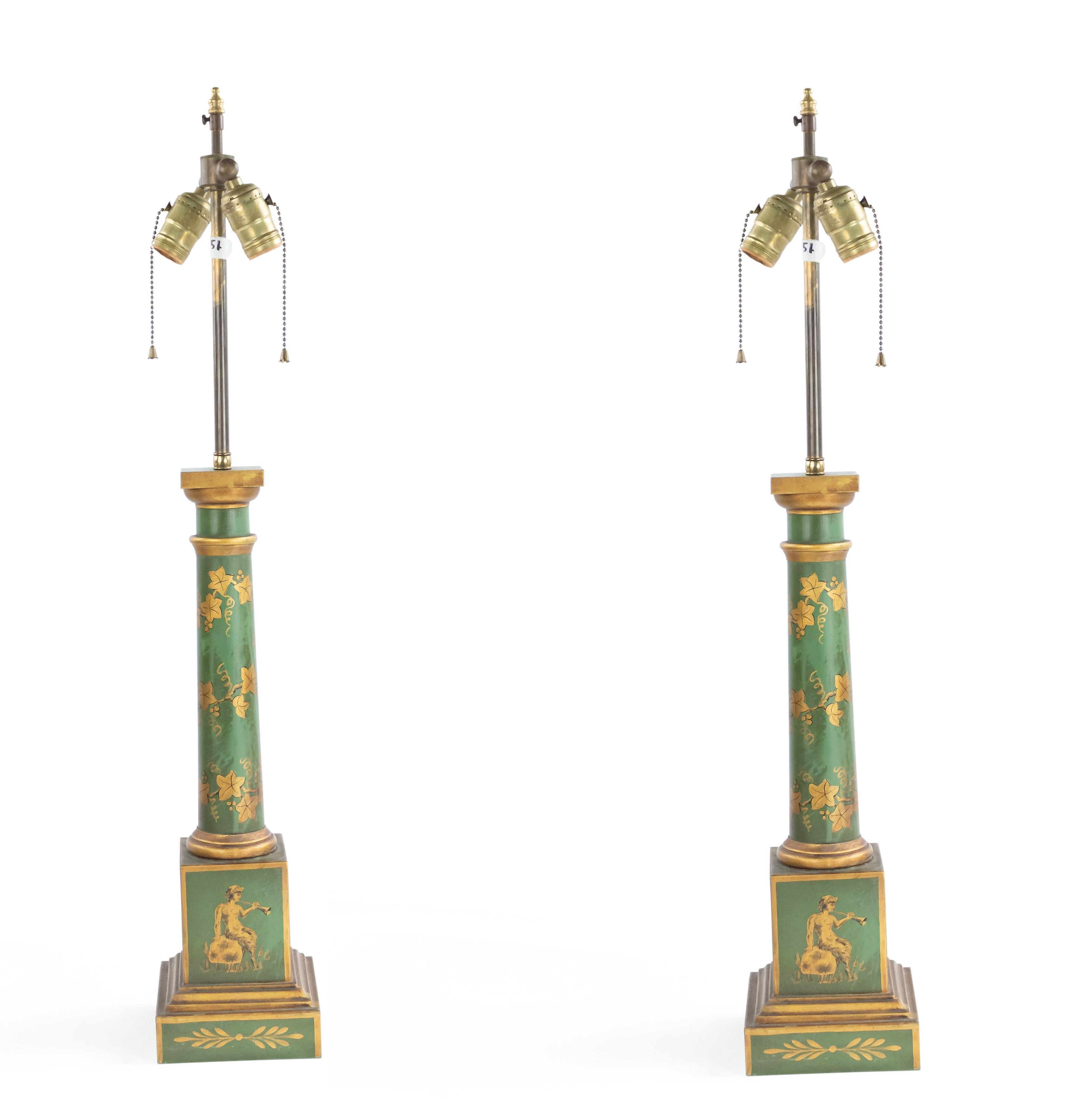 Pair of French Directoire style 20th century green and gold tole floral decorated column table lamps.