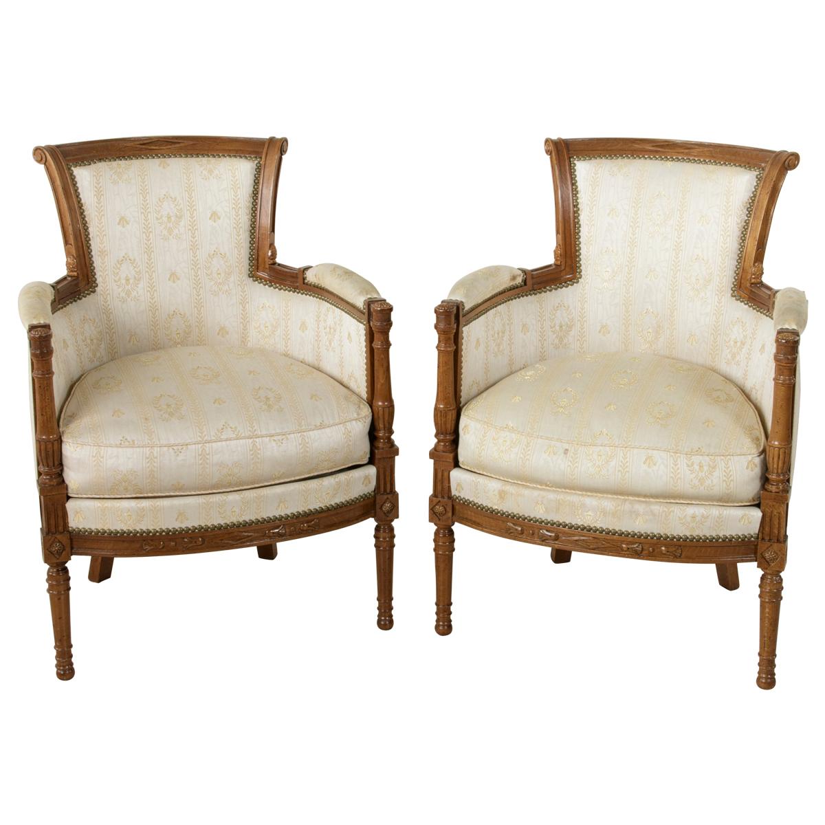 Pair of French Directoire Style Walnut Bergères or Armchairs, circa 1900