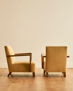 Paire de fauteuils club français à accoudoirs ouverts Dominique c. 1940's