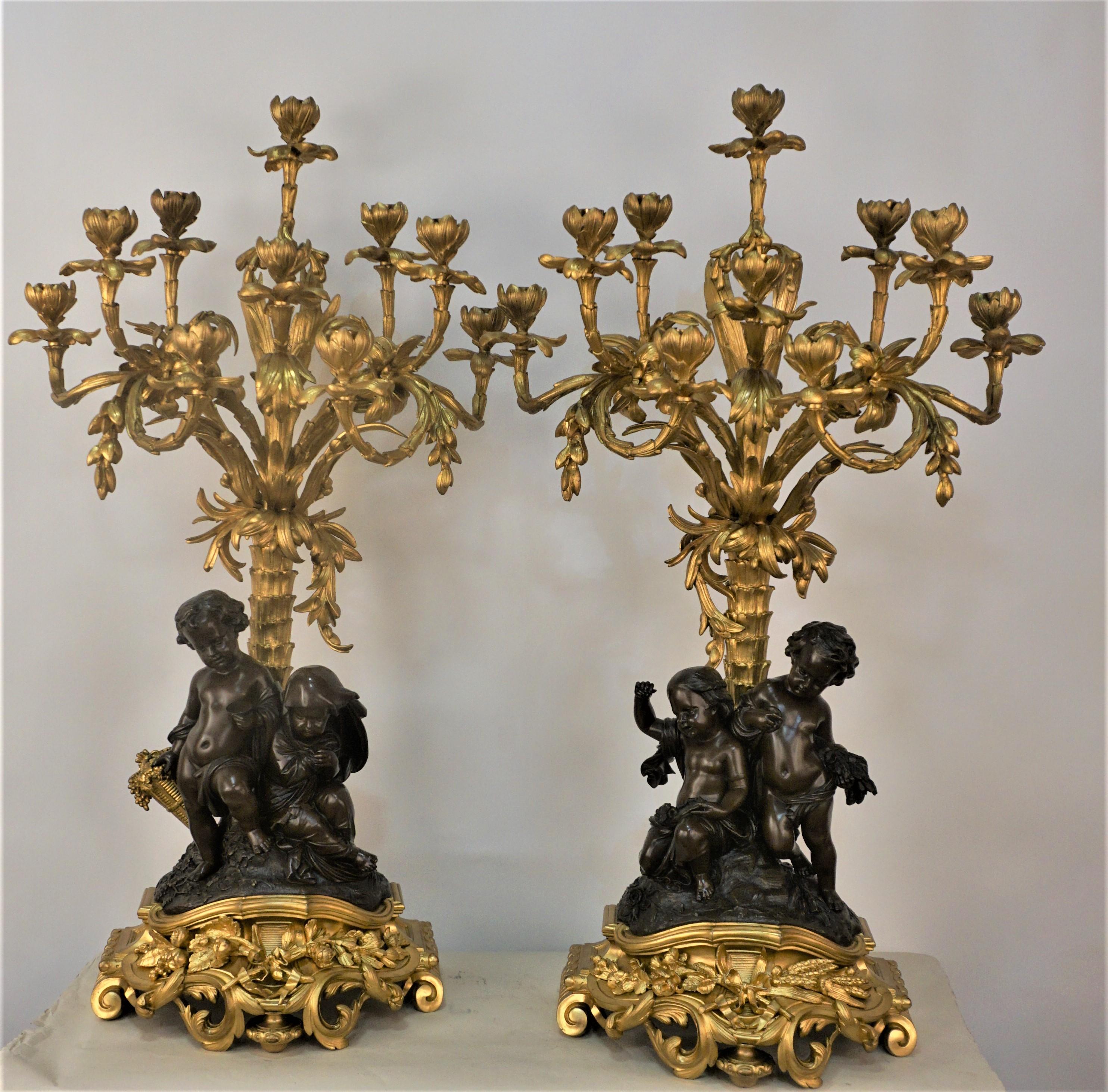 Pair of 19th century ten light candelabra with patinated and Dore bronze finish by Henry Picard Paris. These candelabras are 36.5
