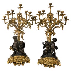 Pair of French Dore and patinated bronze Candelabra by Henri Picard
