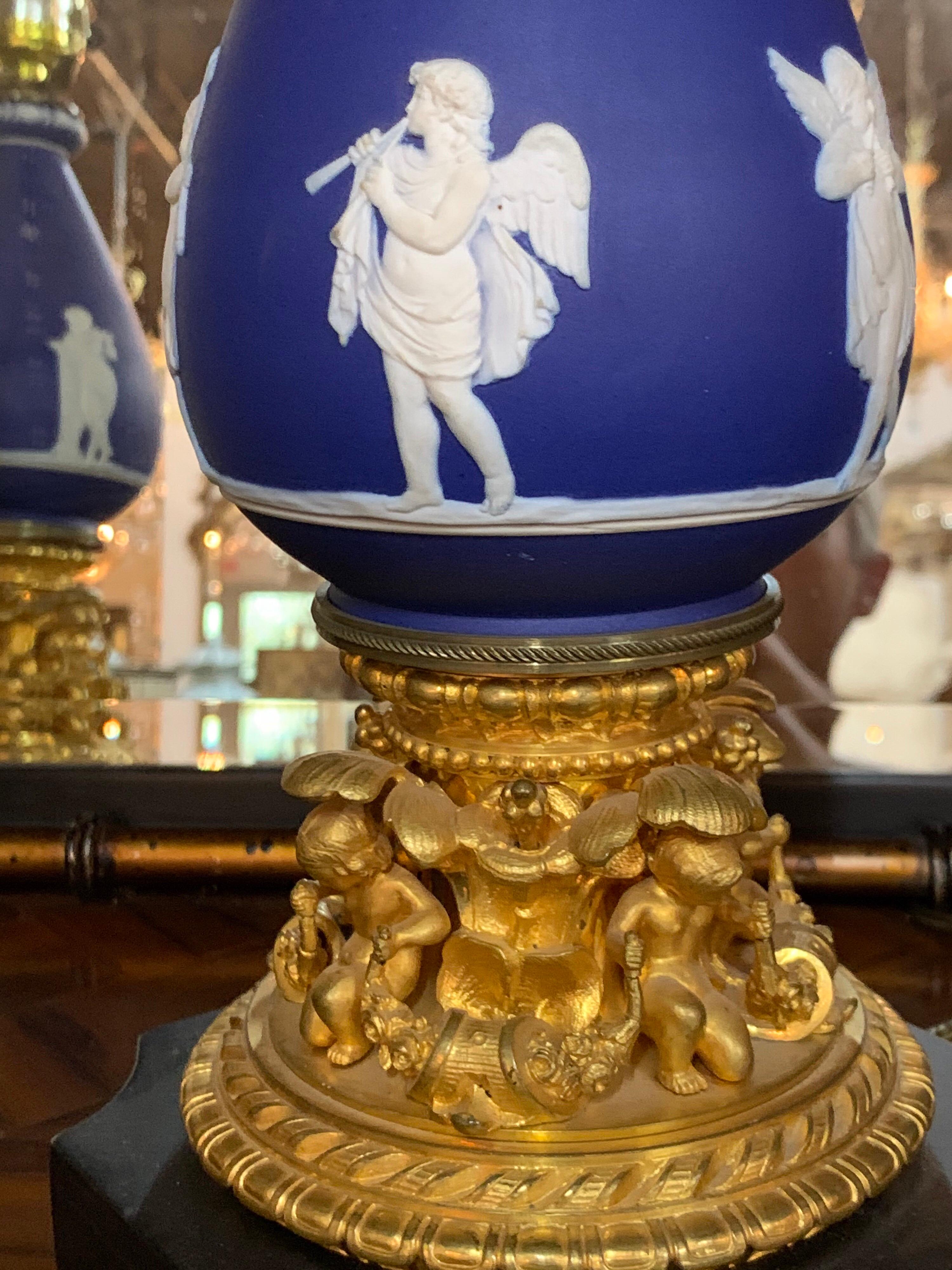 Pair of French Doré Bronze and Wedgewood Cherub Form Lamps 1