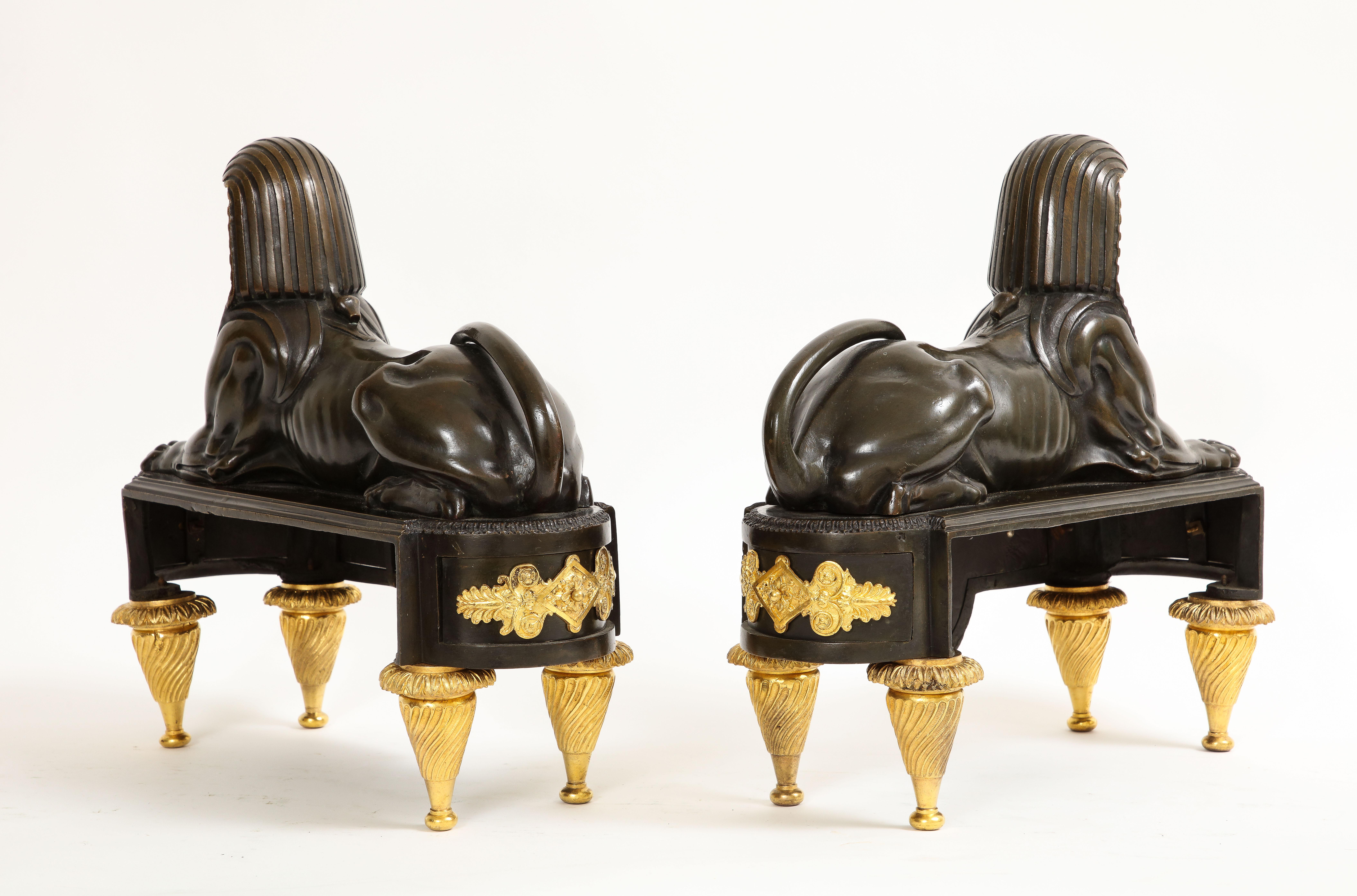 Pair of French Early 19th C. Patinated and Dore Bronze Egyptian Revival Chenets In Good Condition For Sale In New York, NY