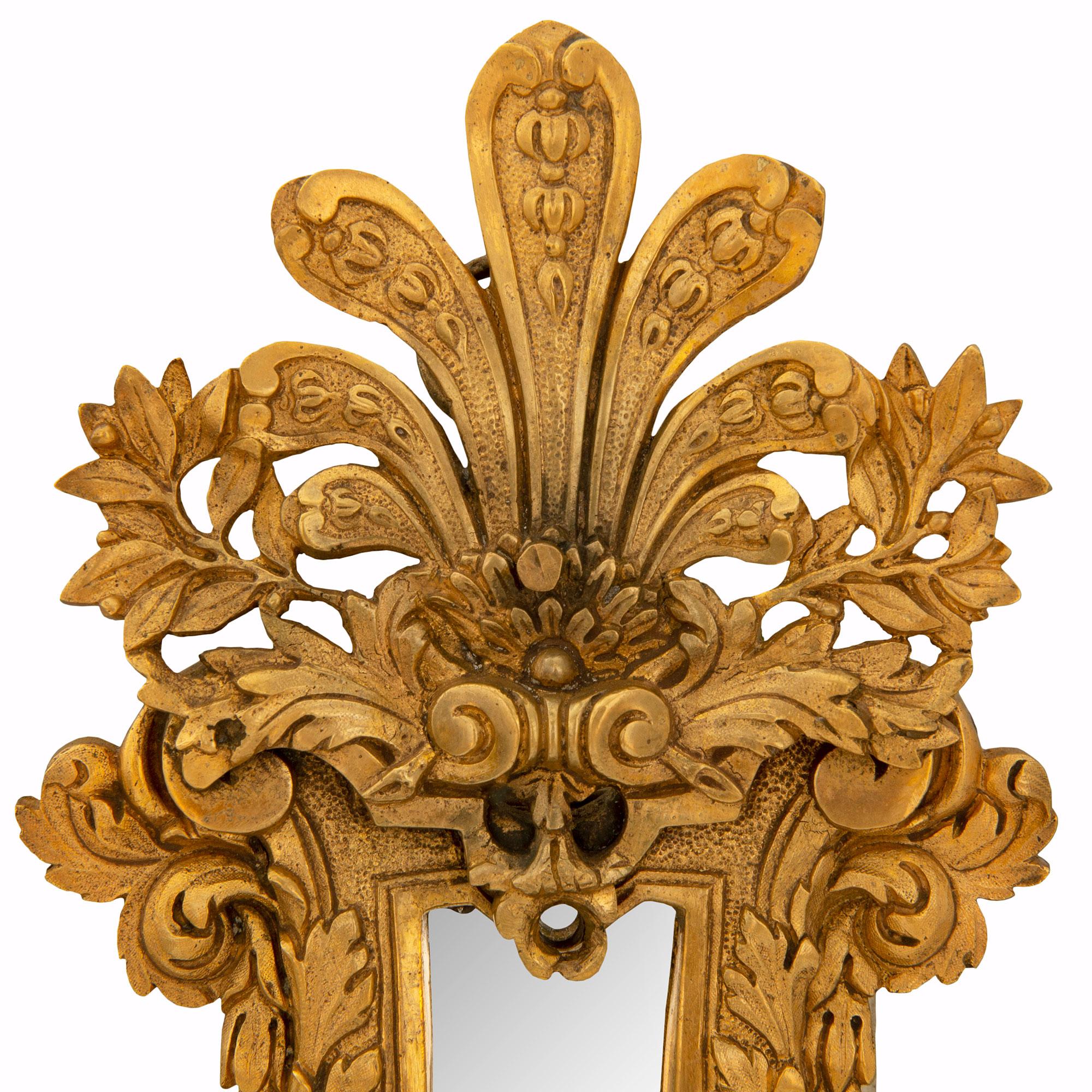 Mirror Pair of French Early 19th Century Louis XIV St. Ormolu Sconces For Sale