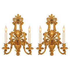 Pair of French Early 19th Century Louis XIV St. Ormolu Sconces