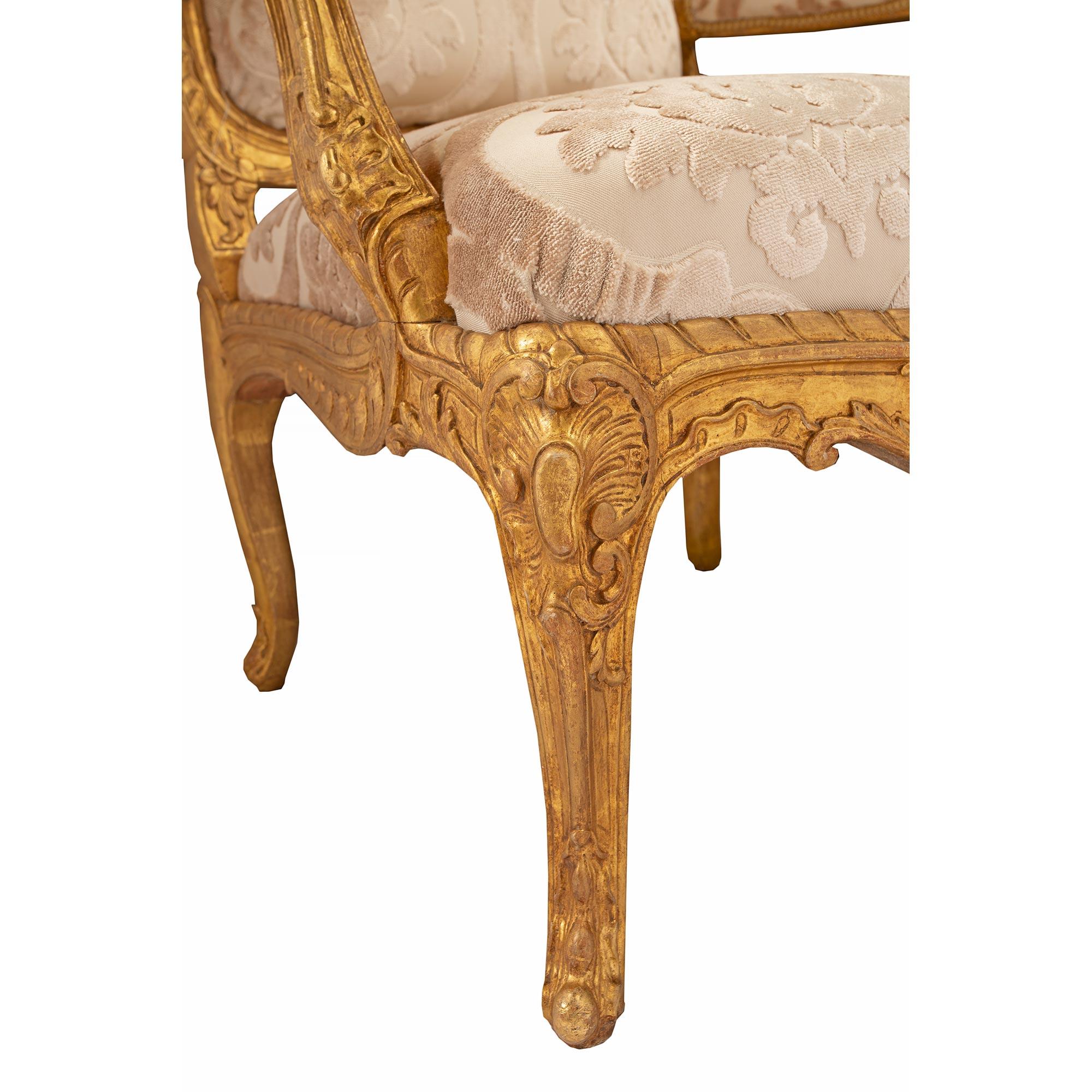 Pair of French Early 19th Century Louis XV St. Giltwood Armchairs For Sale 5