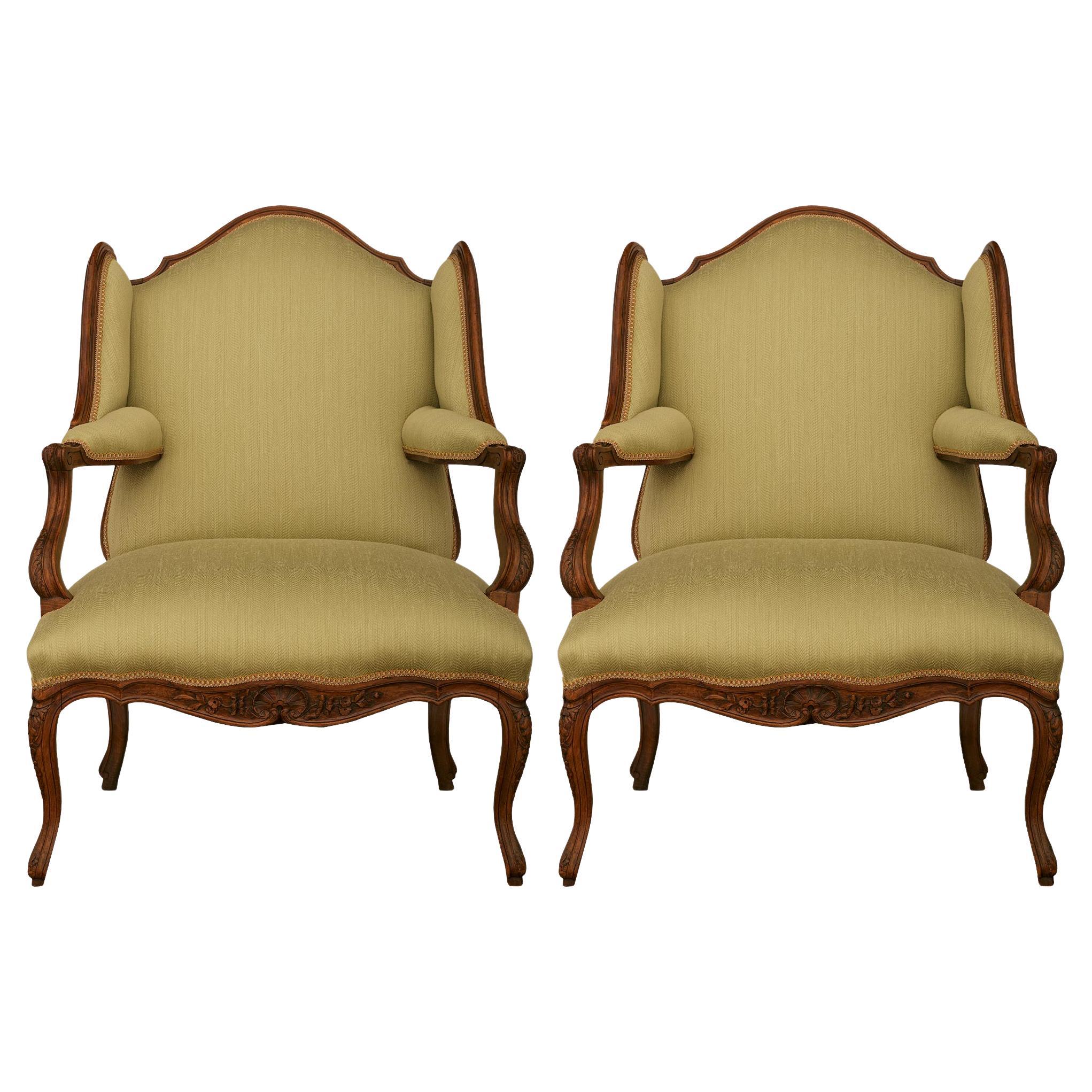 pair of French early 19th century Louis XV st. Walnut armchairs