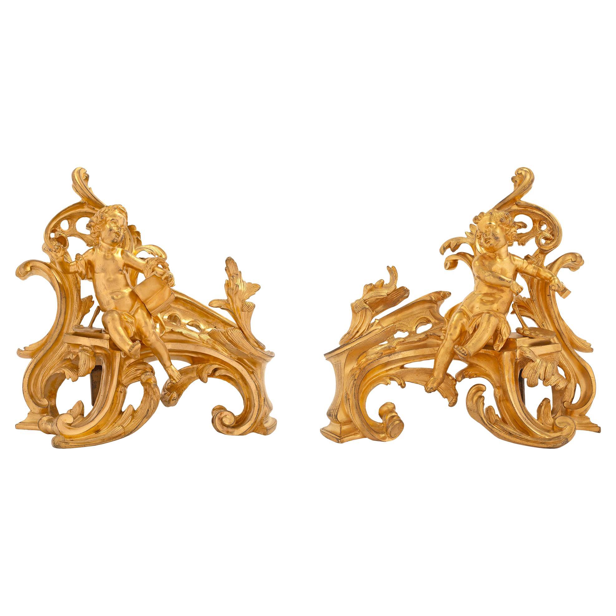 Pair of French Early 19th Century Louis XV Style Ormolu Andirons For Sale