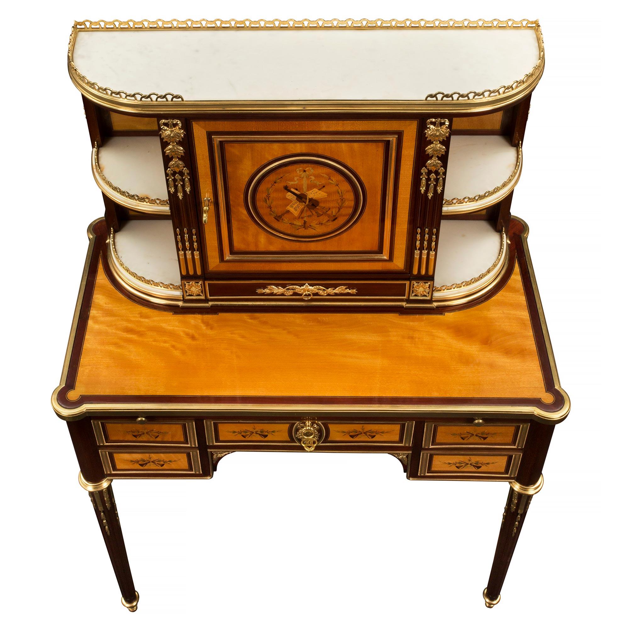 A magnificent pair of French early 19th century Louis XVI St. Bonheurs du Jours, which literally means, the joy of the day. A type of writing desk introduced in Paris by renowned interior decorators and purveyors of style - Marchands Merciers,