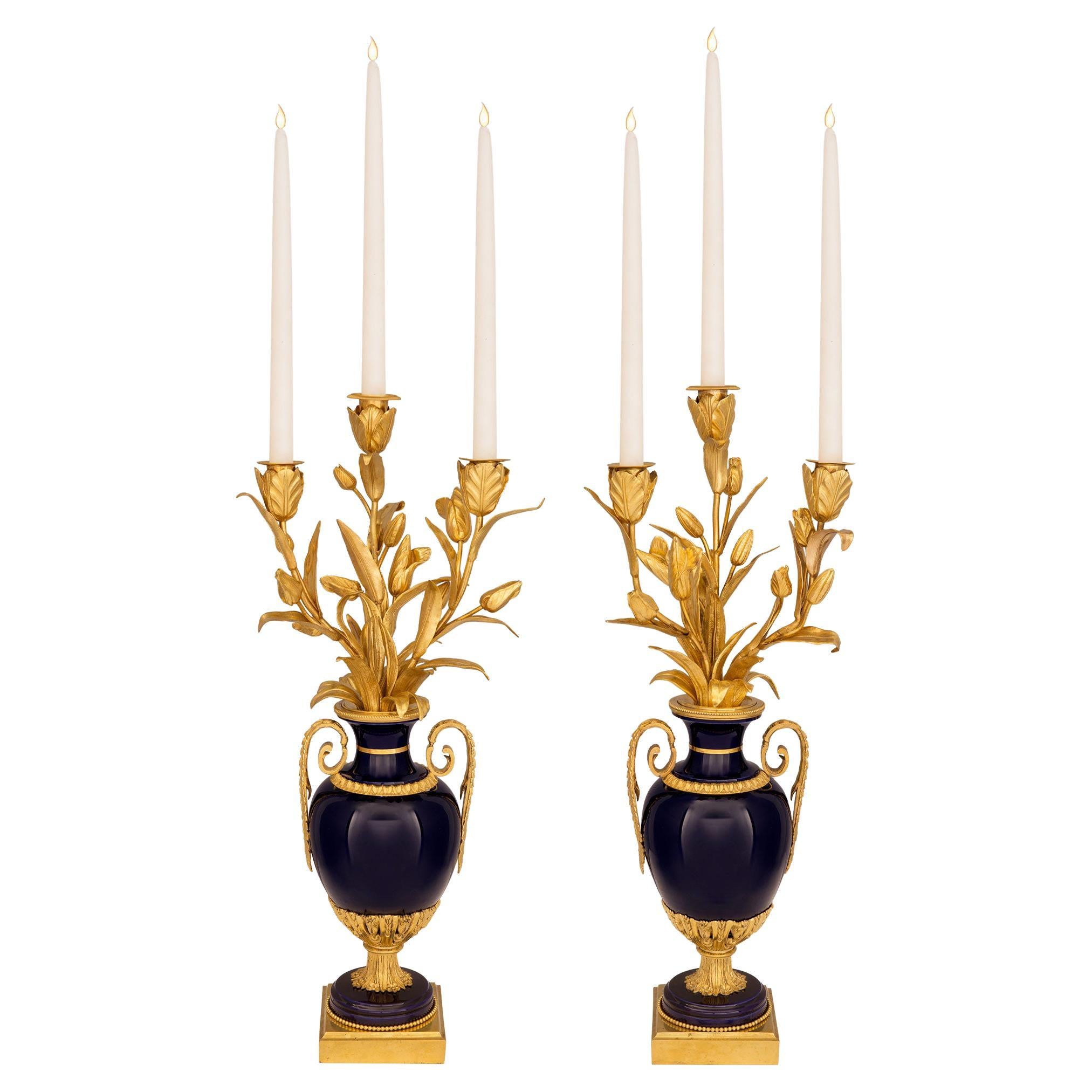Pair of French Early 19th Century Louis XVI St. Porcelain and Ormolu Candelabras
