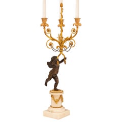 Coppia di candelabri francesi dell'inizio del XIX secolo in stile Luigi XVI