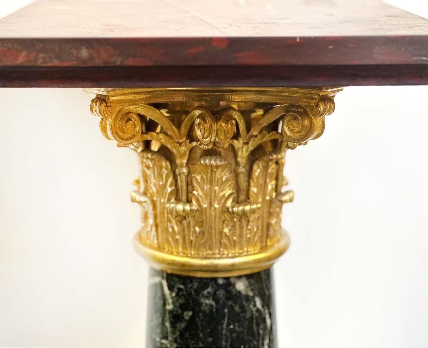 Pair of impressive pedestals made of fine quality green and red marble as well as great bronze details. Made in France, Early 19th Century. 
Dimensions:
46