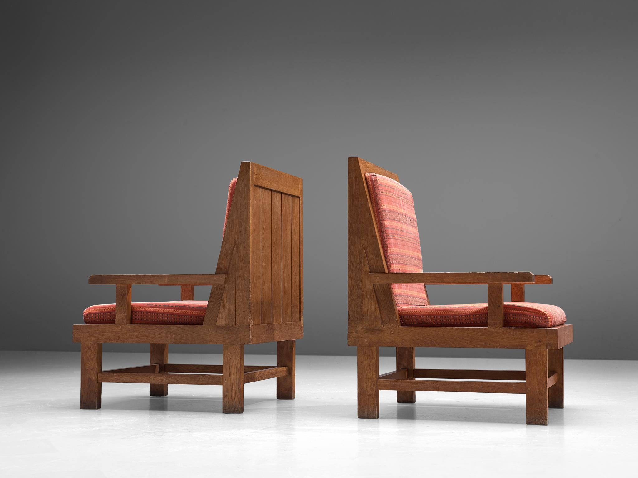 Pair of armchairs, beech and fabric, France, 1920s.

These sturdy easy chairs, made in France, are geometric in its forms as it is build up completely in horizontal and vertical lines. The backrest is vertical comfortable armchairs have an