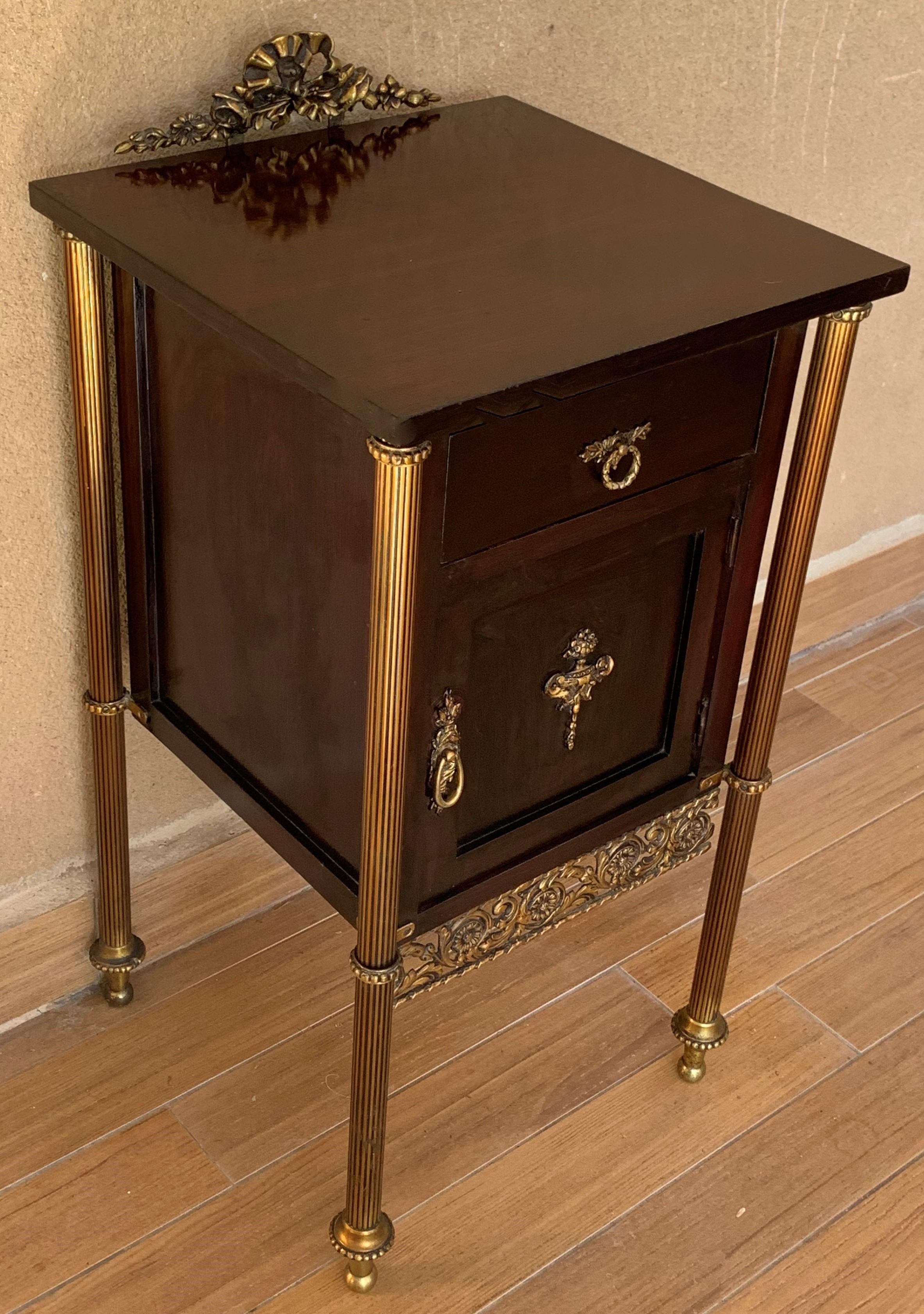 Neoclassical Pair of French Ebonized Mahogany Nightstands with Fluted Bronze Columns For Sale