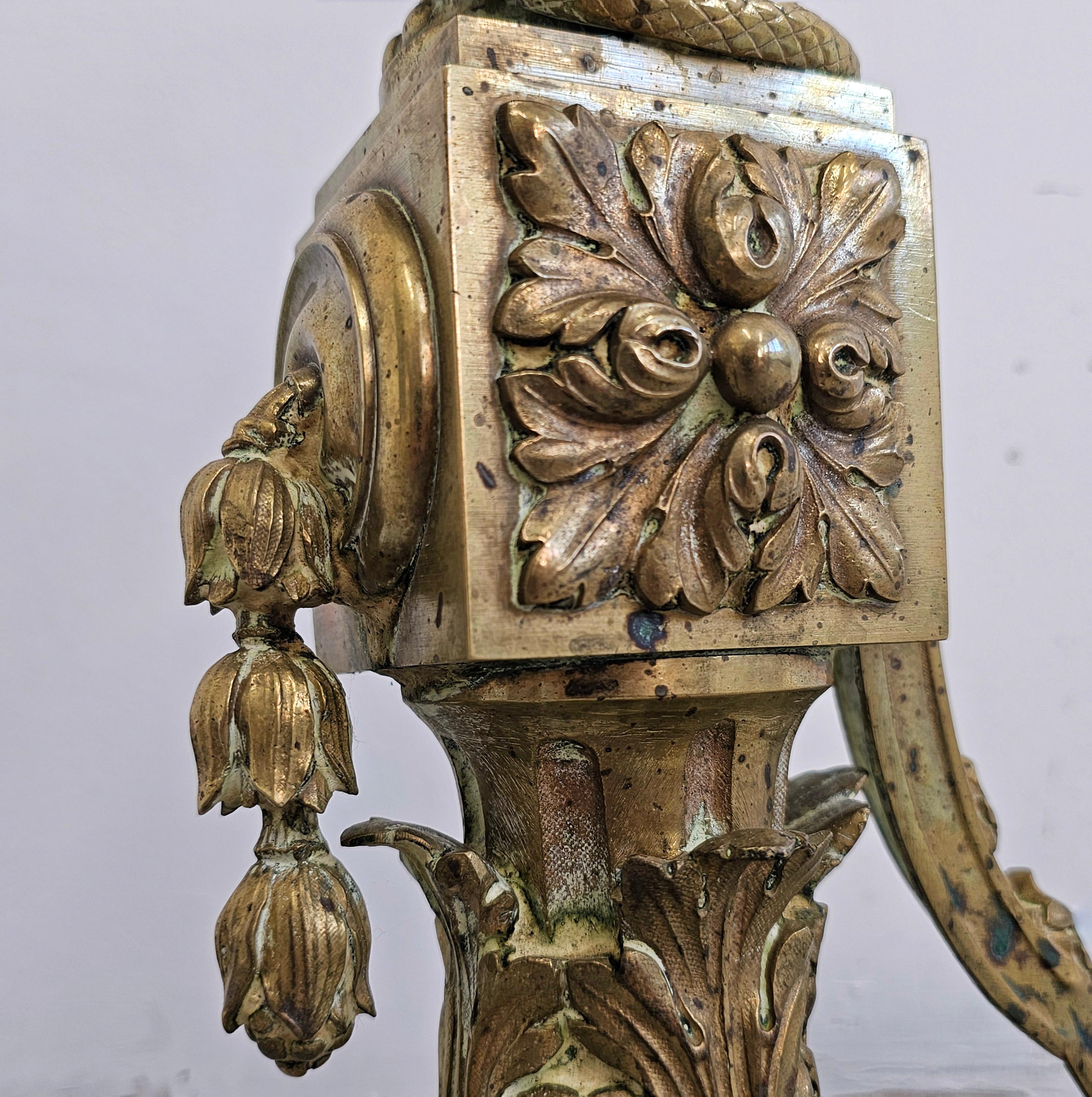 Pair of French Empire Andirons done in gilt brass, featuring snakes and ram head For Sale 4