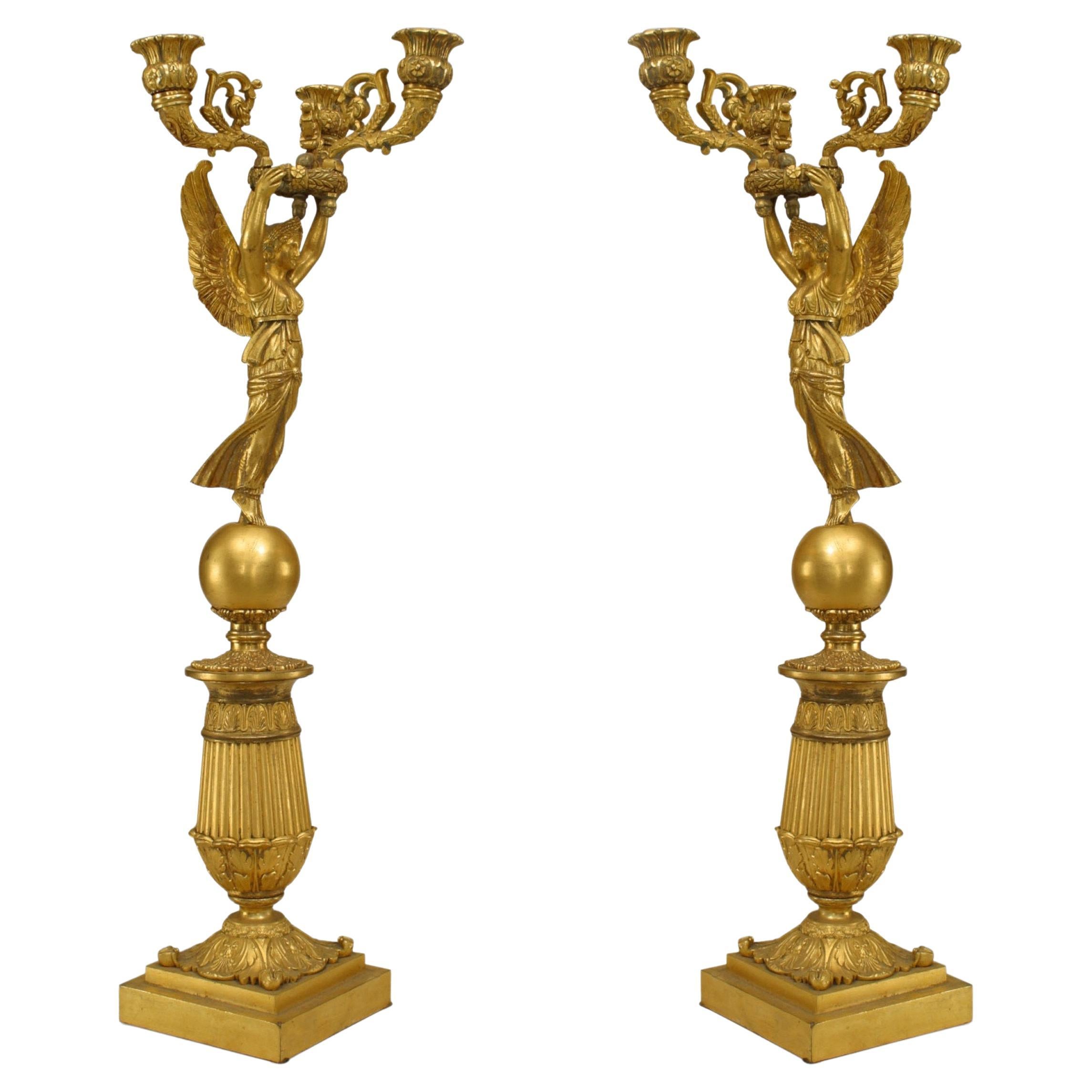 Pair of French Empire Bronze Dore Candelabras with Winged Figures For Sale