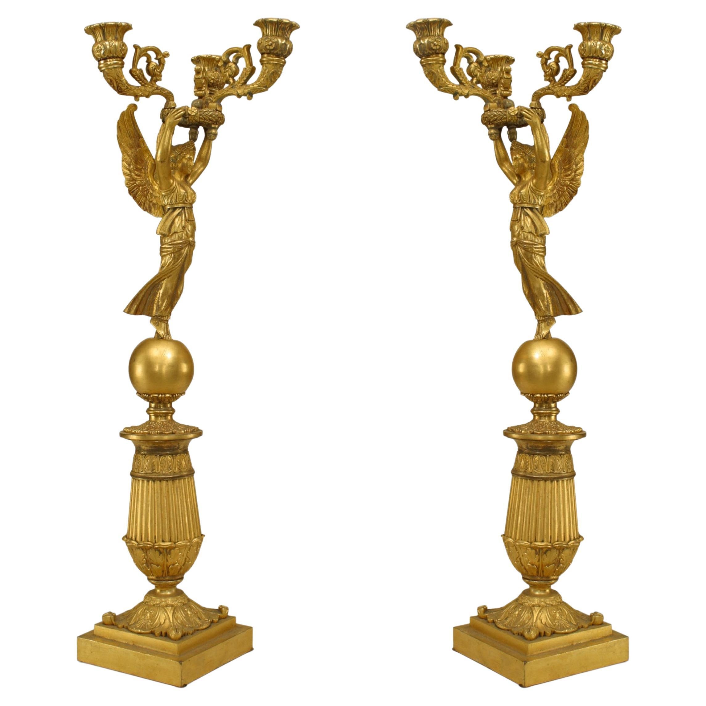 Pair of French Empire Bronze Dore Candelabras with Winged Figures