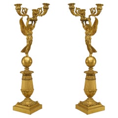 Pair of French Empire Bronze Dore Candelabras with Winged Figures