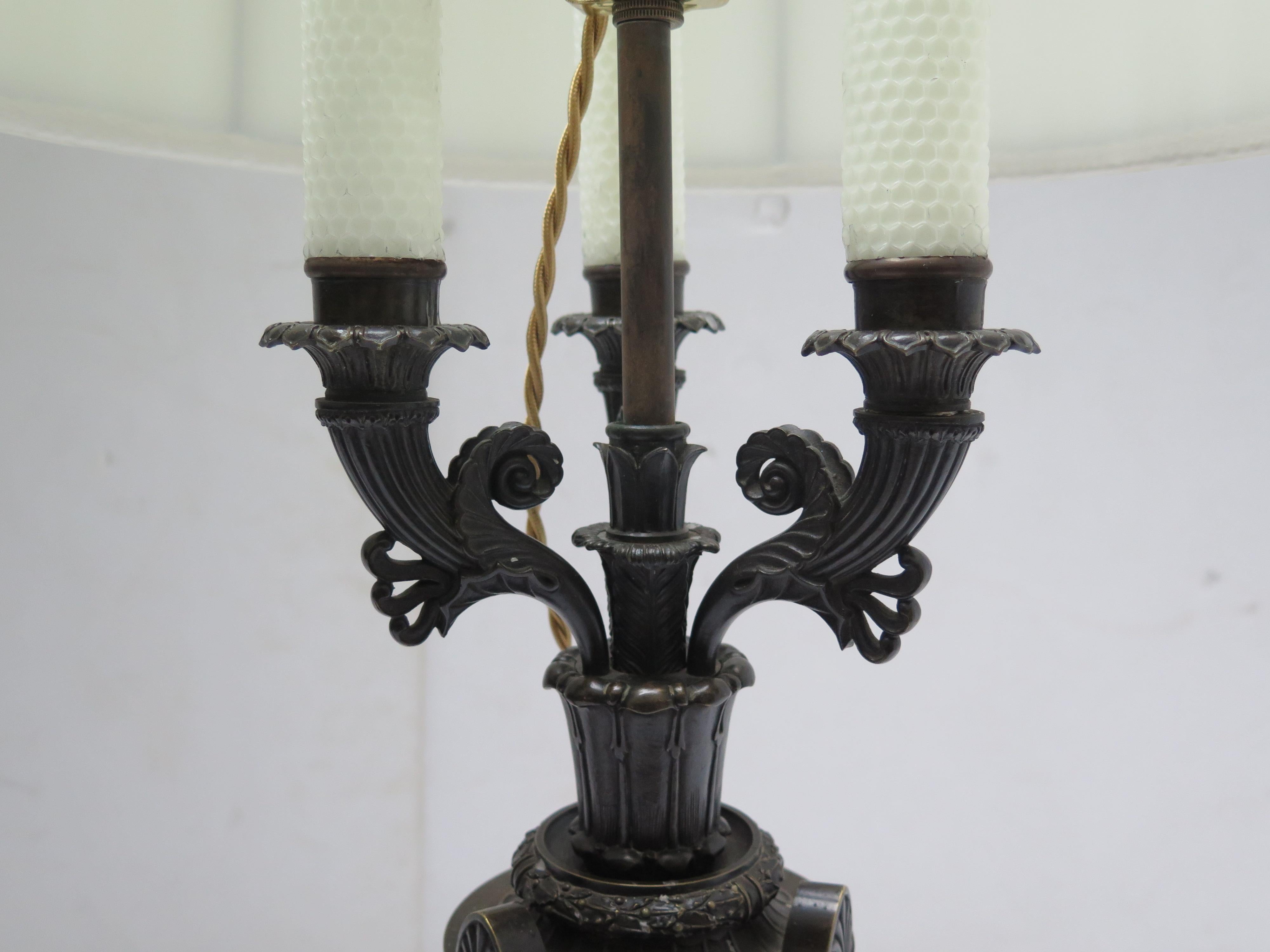 Patinated Pair of French Empire Candelabra in the Manner of Pierre-Philippe Thomire