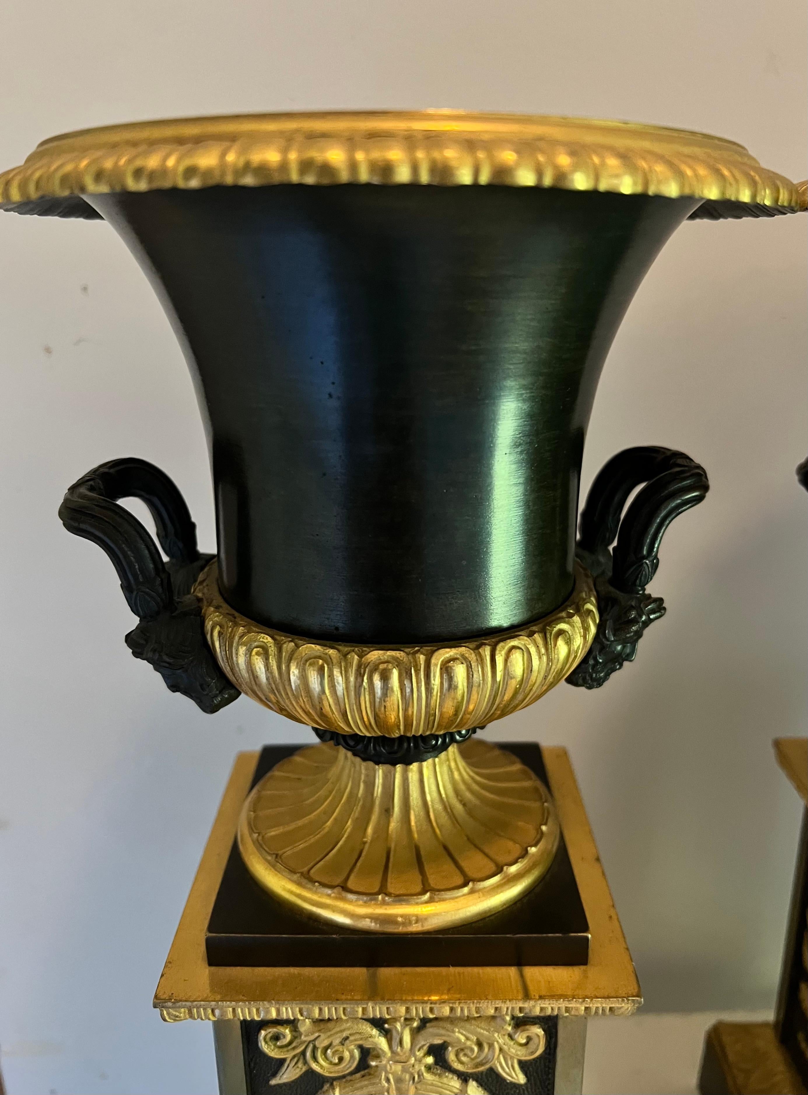 Pair of French Empire Dore Bronze Urns on Pedestals For Sale 1