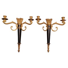 Pareja de candelabros de bronce dorado ebonizado Imperio francés
