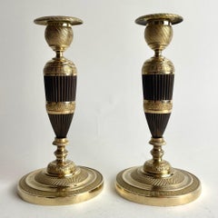 Pair of French Empire Gilt and Patinated Bronze Candlesticks, 1820s