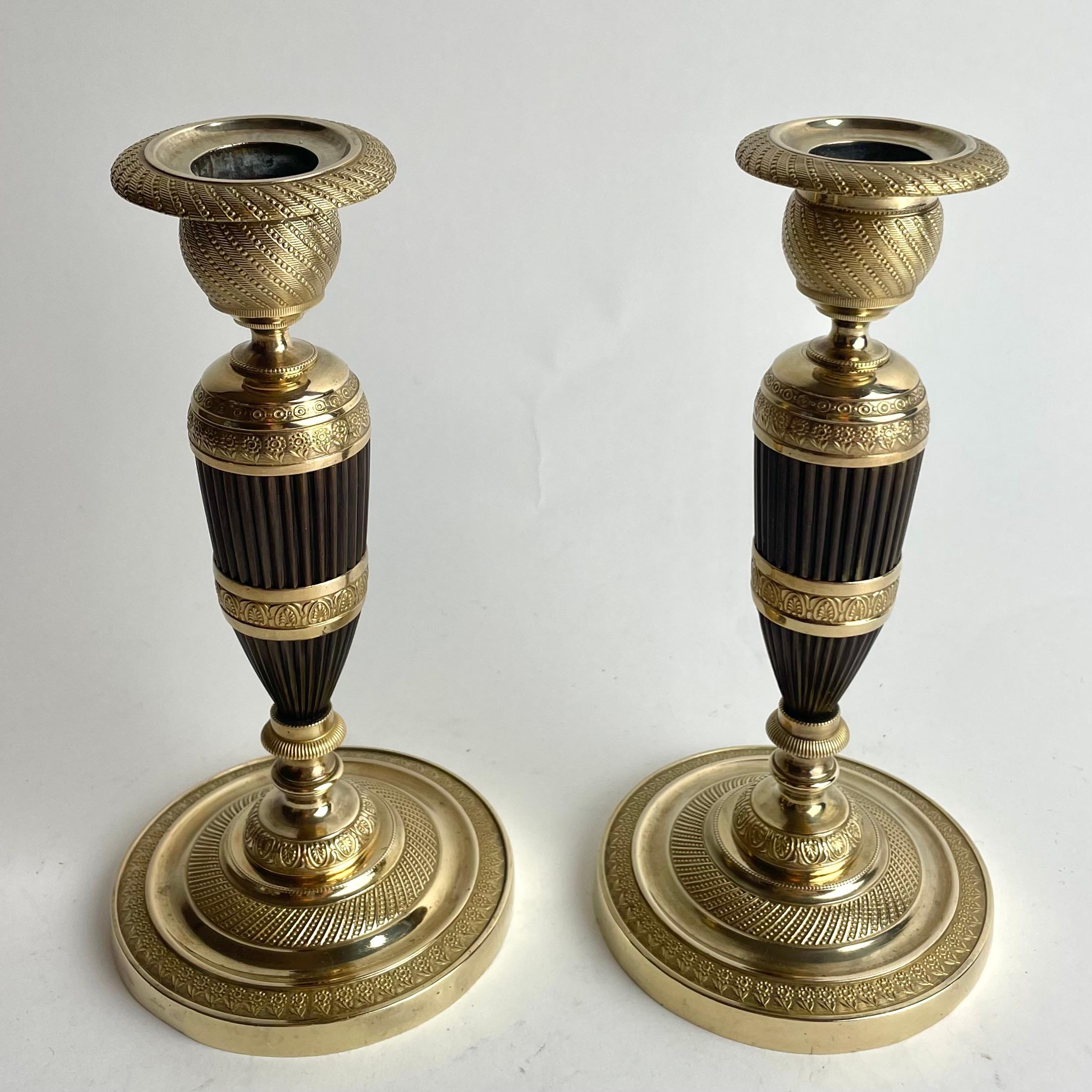 Early 19th Century Pair of French Empire Gilt and Patinated Bronze Candlesticks, 1820s For Sale