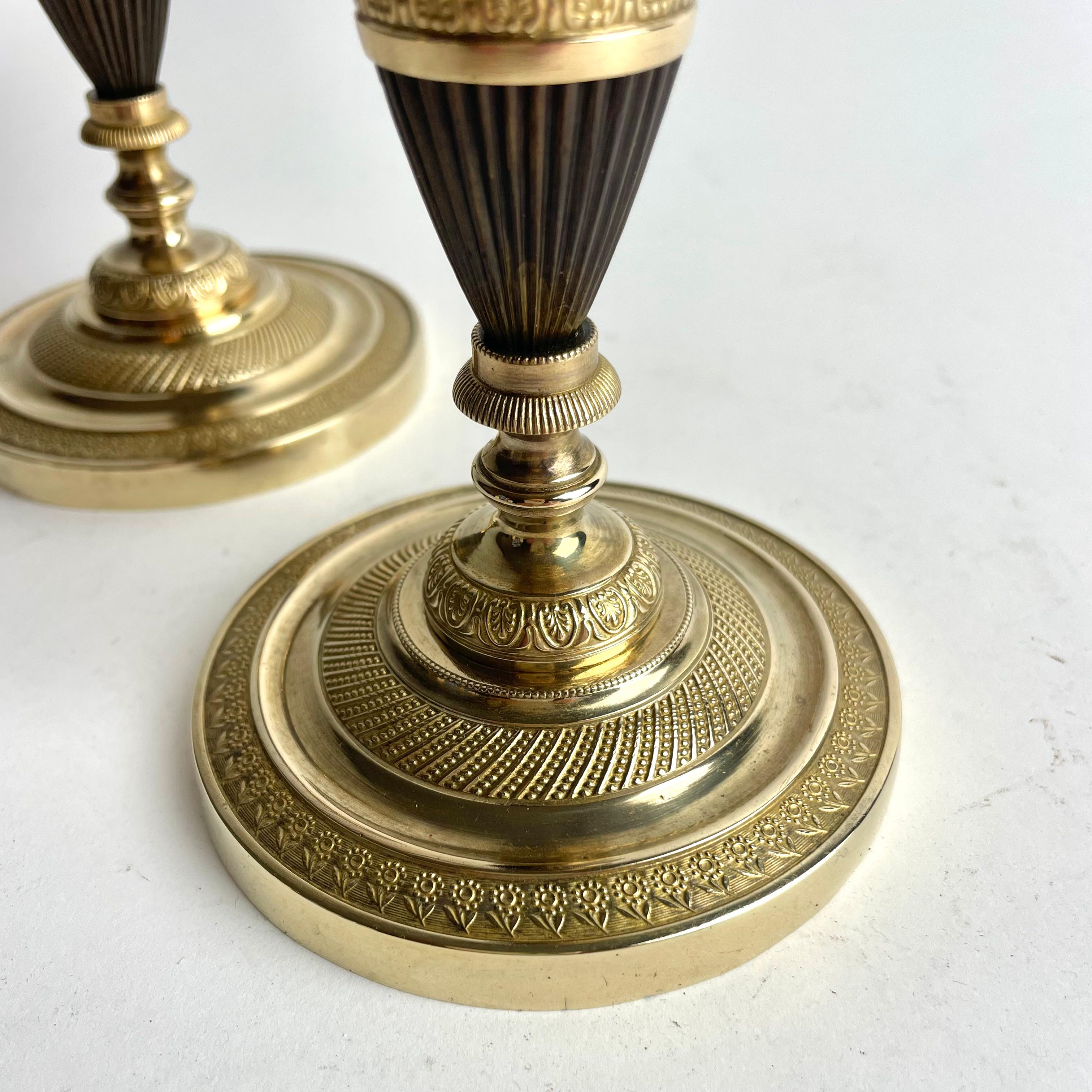 Pair of French Empire Gilt and Patinated Bronze Candlesticks, 1820s For Sale 1