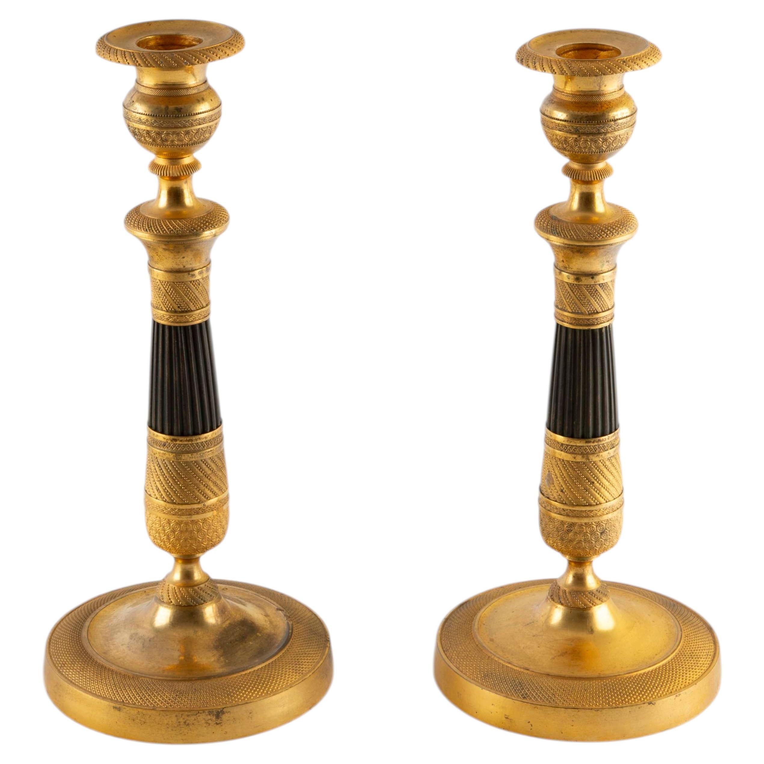Pair of French Empire Gilt and Patinated Bronze Candlesticks, 19th C