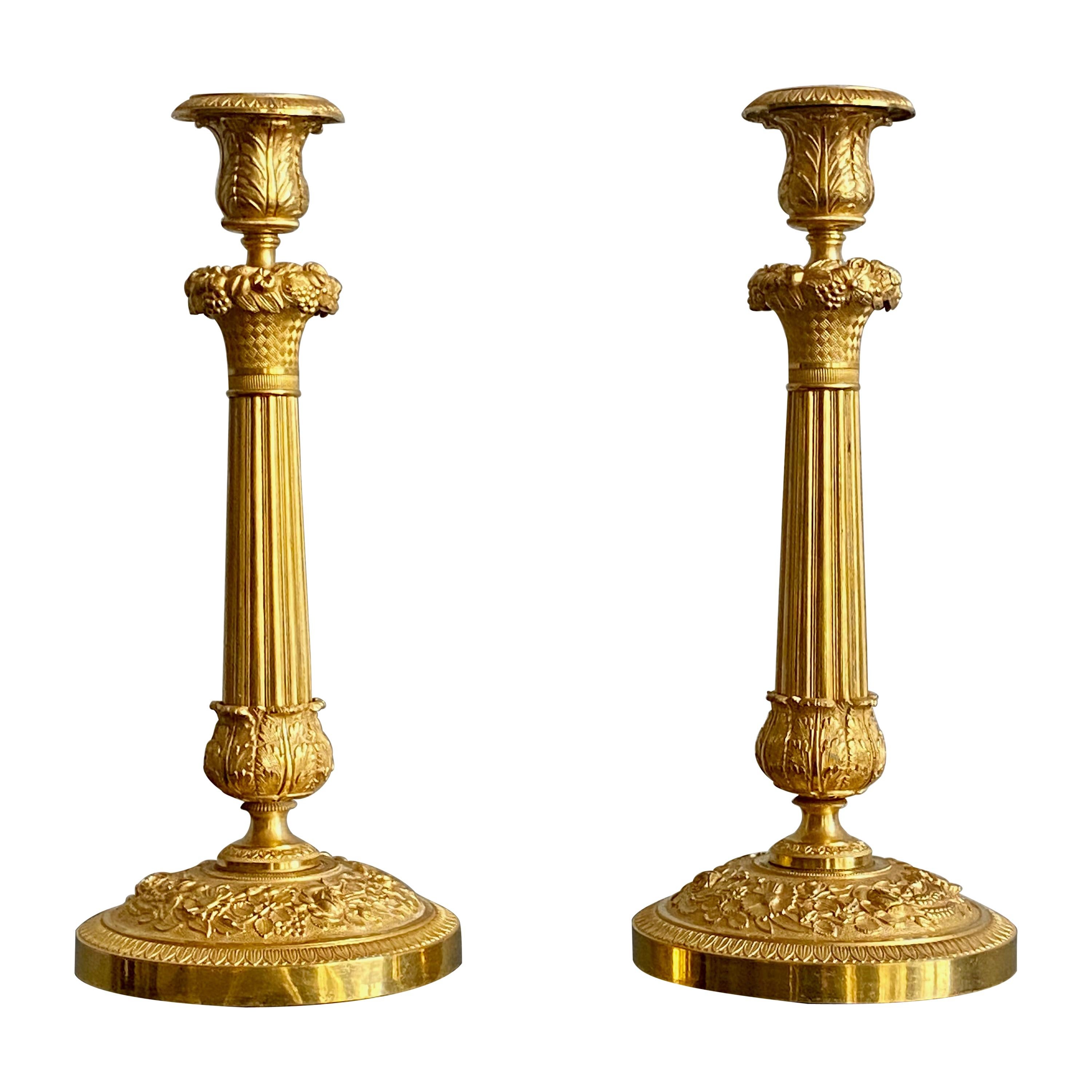 Pair of French Empire Gilt Bronze Candle Sticks