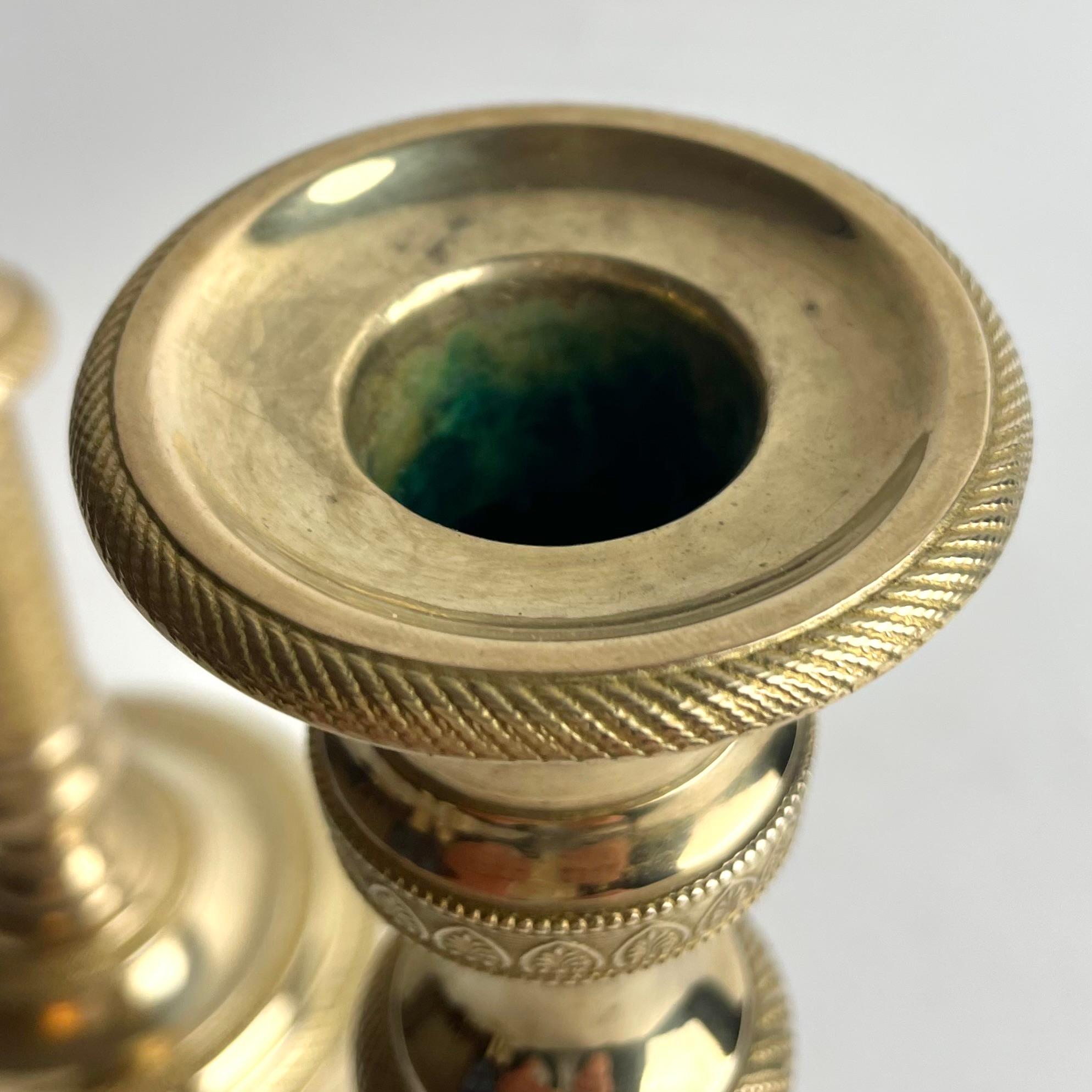 Bronzo Pair of French Empire Gilt Bronze Candlesticks, 1820s in vendita