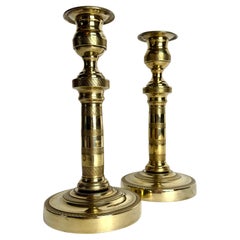 Paire de chandeliers Empire en bronze doré, années 1820