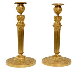 Pair of French Empire Gilt Bronze Candlesticks