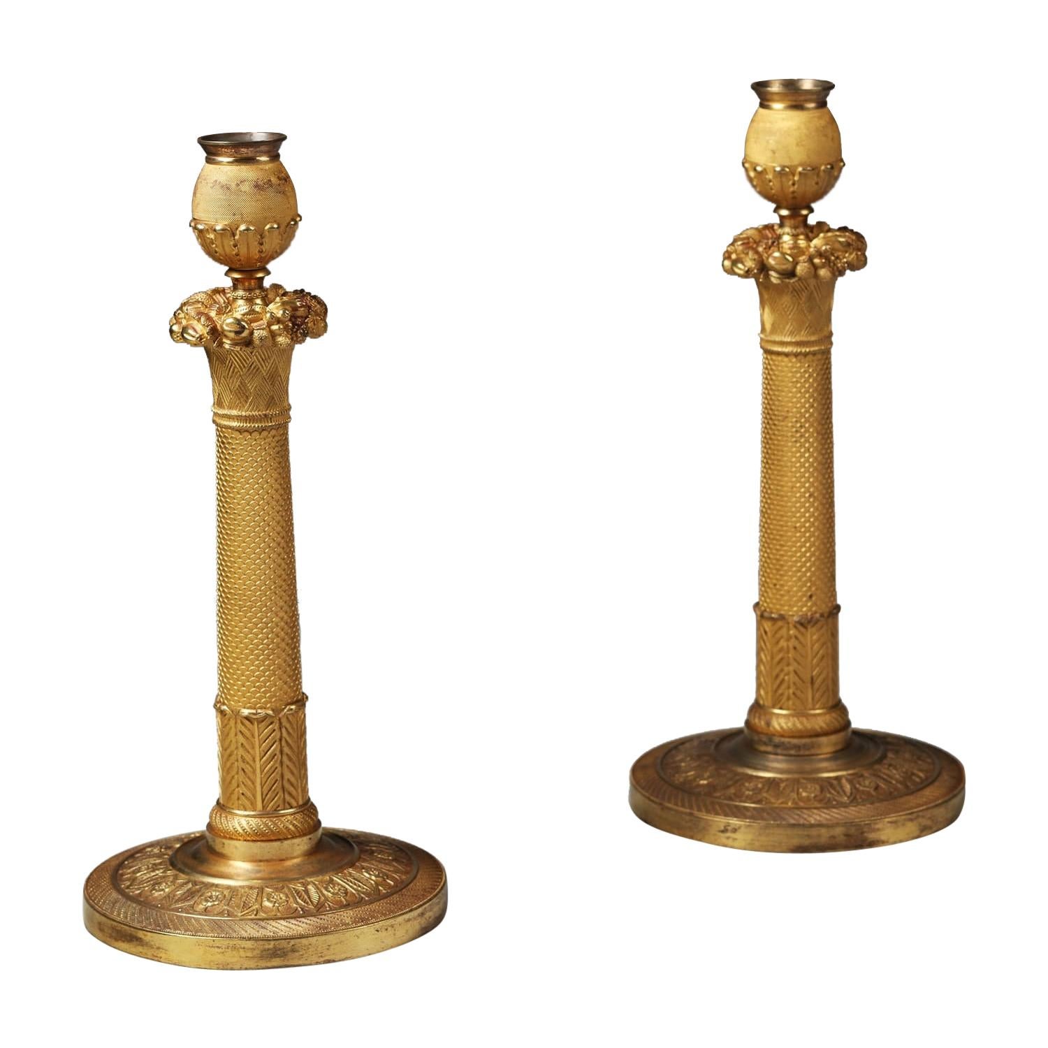 Pair of gilt bronze Empire French candlesticks signed Escalier De