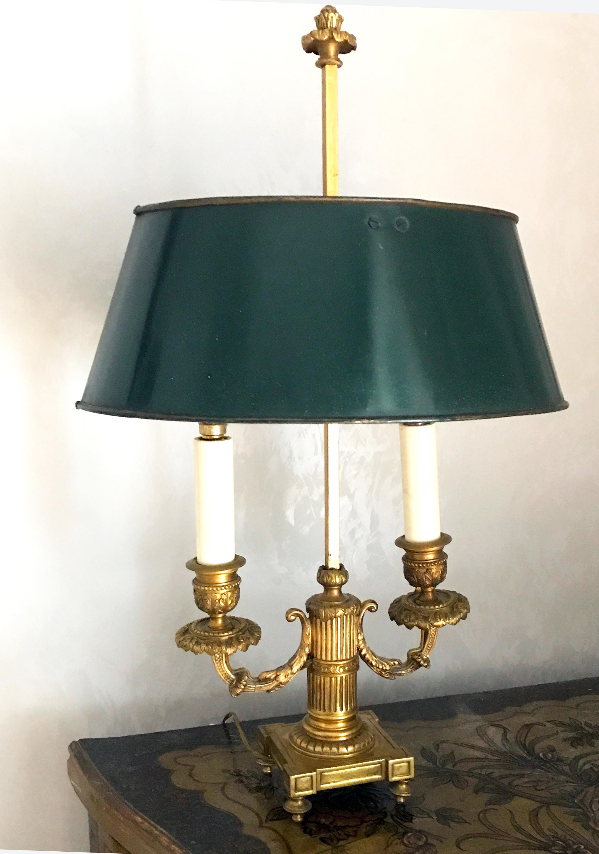 Elegant Empire gilded bronze finely chiseled Bouillotte lamps with dark green painted tole adjustable shade.
Two E 14 light bulbs.
We can deliver wired for US standard.

 