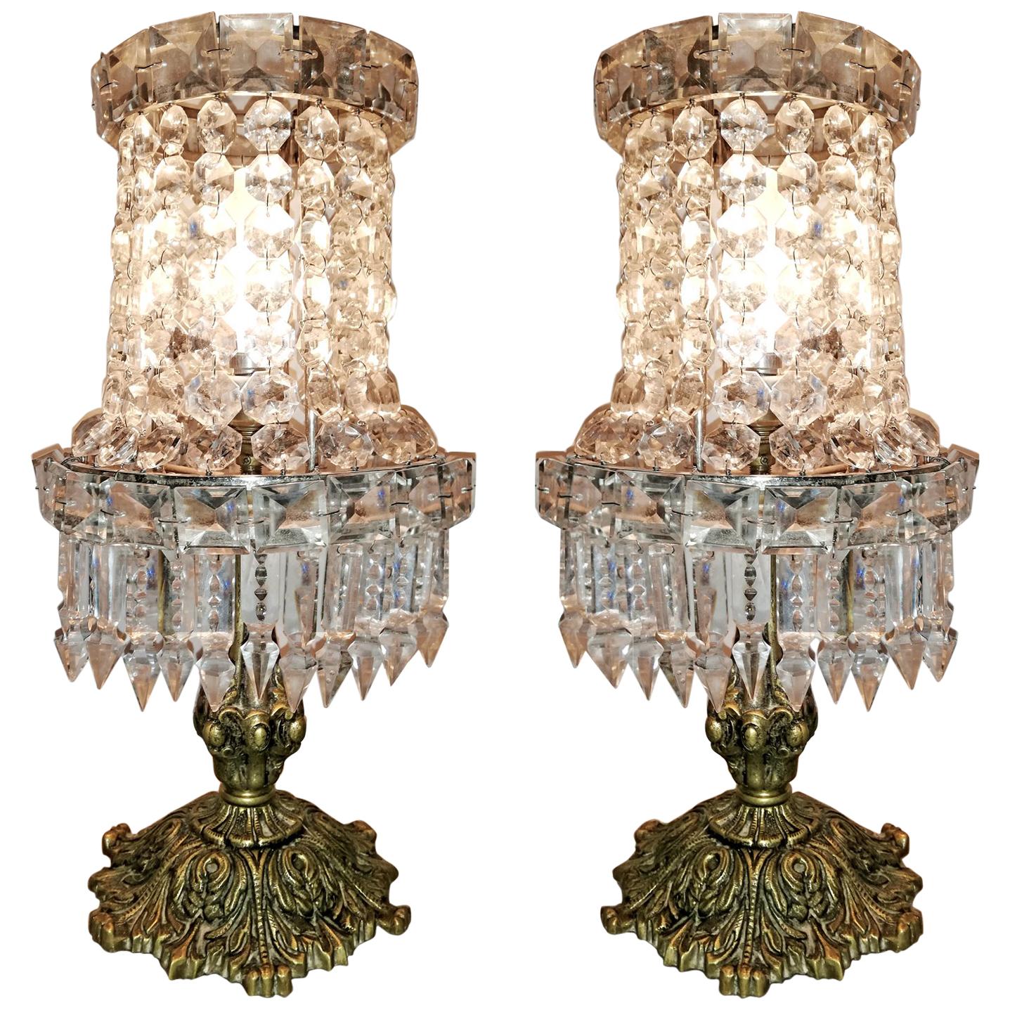 Pair of French Regency Empire in bronze and crystal table lamps
Housing one-light bulb each E14. Bronze detailing with all crystal intact.
Measures:
Height 15 in /36 cm
Diameter 7 in /18 cm
Weight: 17 lb. / 8 kg
Two light bulbs ( E14 )
Good working