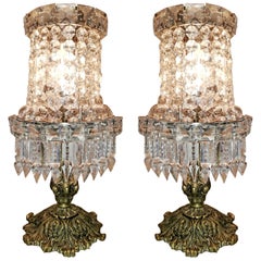 Paar französische Empire-Tischlampen aus Bronze und klarem Kristall im Hollywood-Regency-Stil