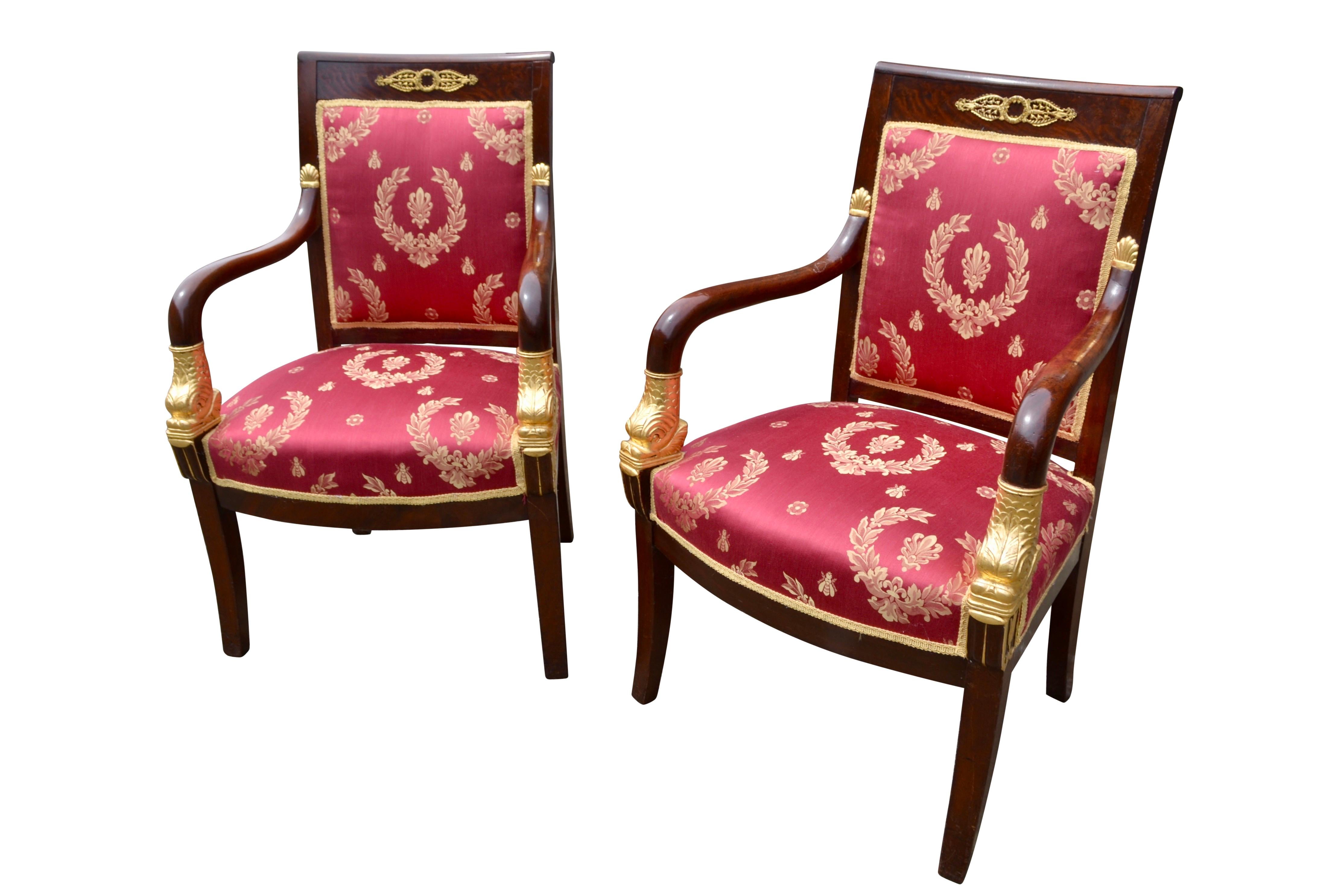 19th Century Pair of French Empire Mahogany Armchairs Accented by Gilded Dolphin Heads