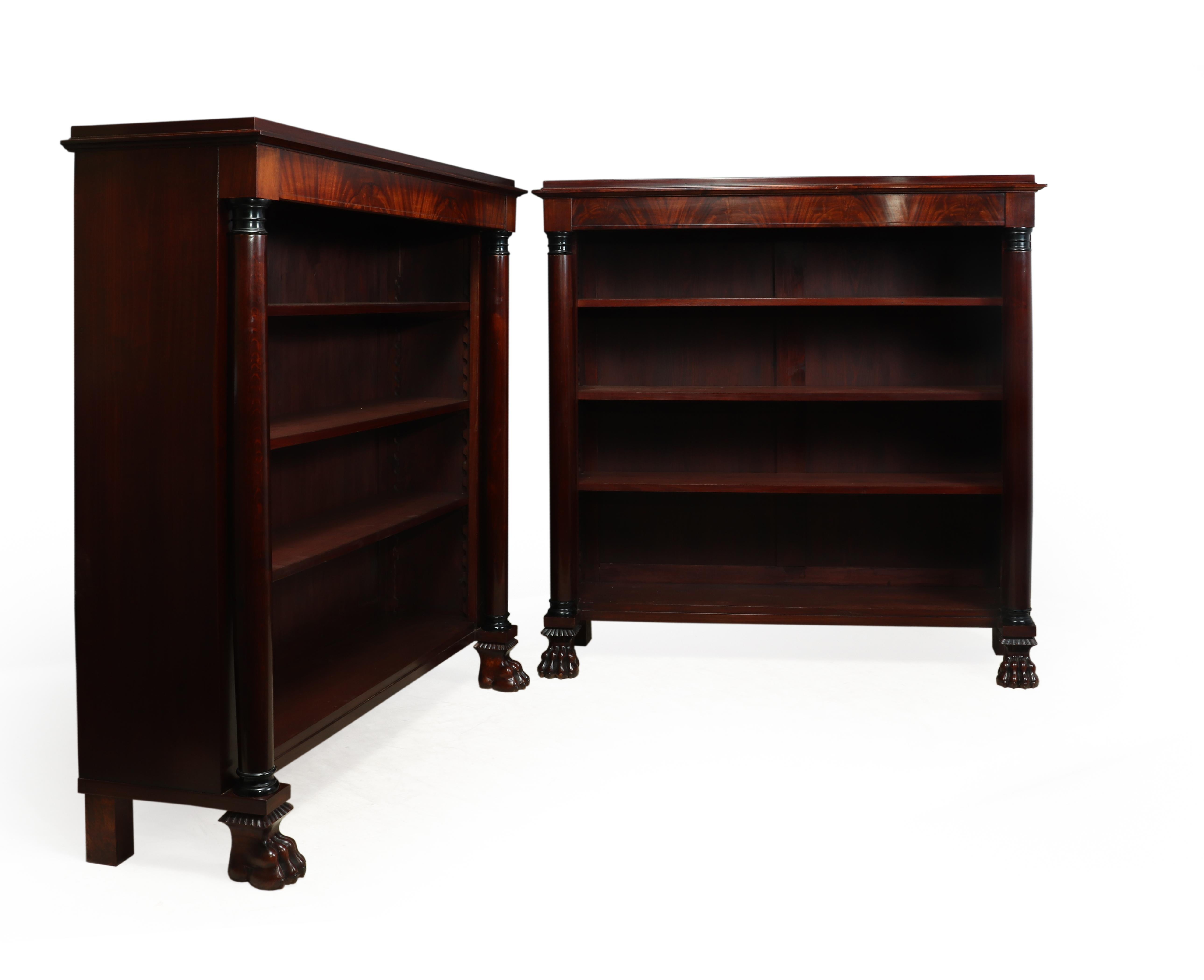 Pair of French Empire mahogany open bookcases, circa 1880

A pair of important French empire style mahogany open bookcases the rectangular tops are supported by turned columns with ebony capitals, each bookcase has three adjustable shelves. This