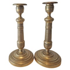 Paire de chandeliers Empire en bronze doré