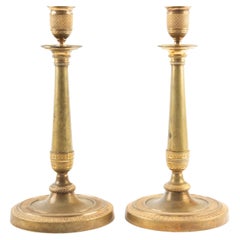 Pair of French Empire Period Gilt Bronze Candlesticks with Guilloché Decoration